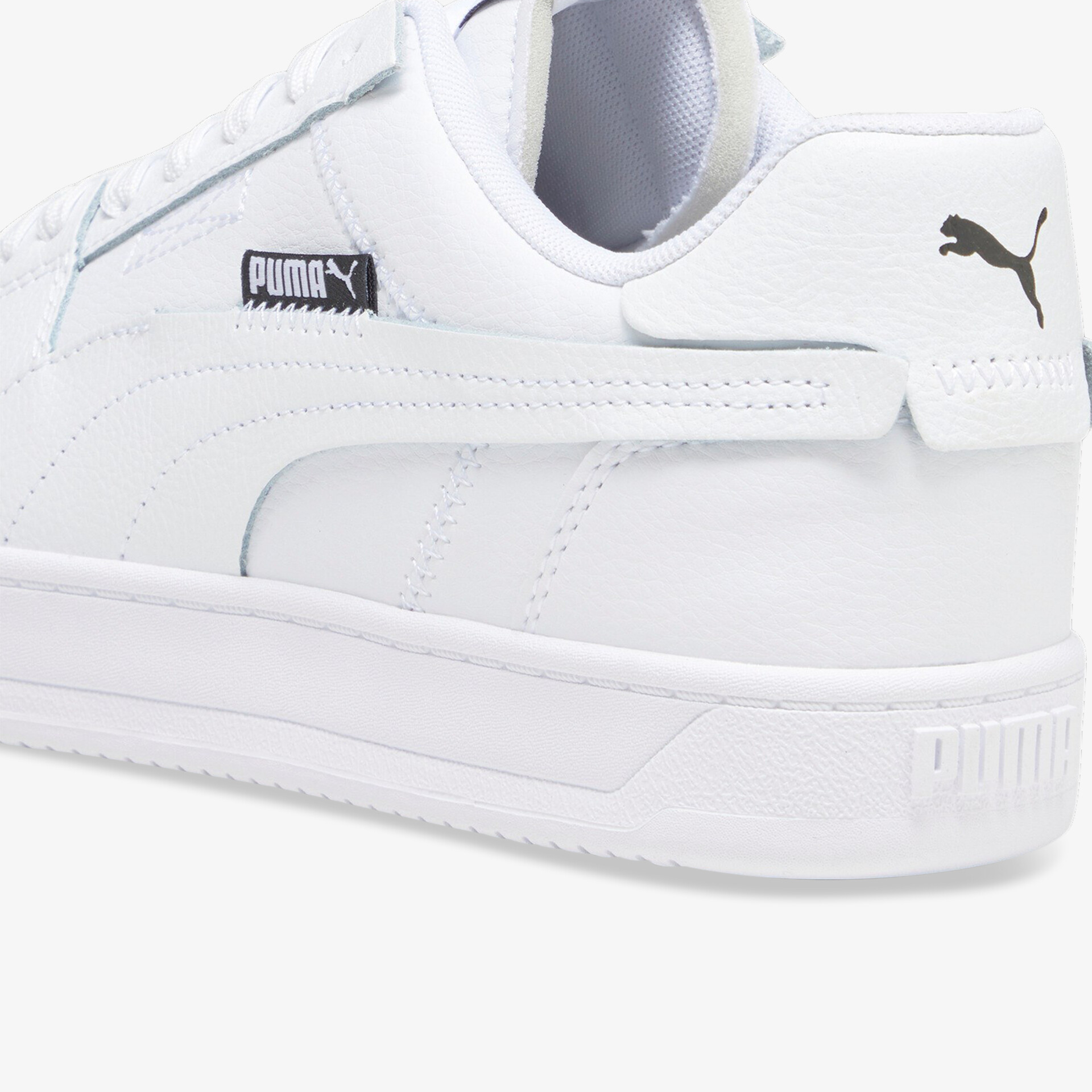 Eleganter weißer Puma-Sneaker mit modernem Design und hohem Tragekomfort.