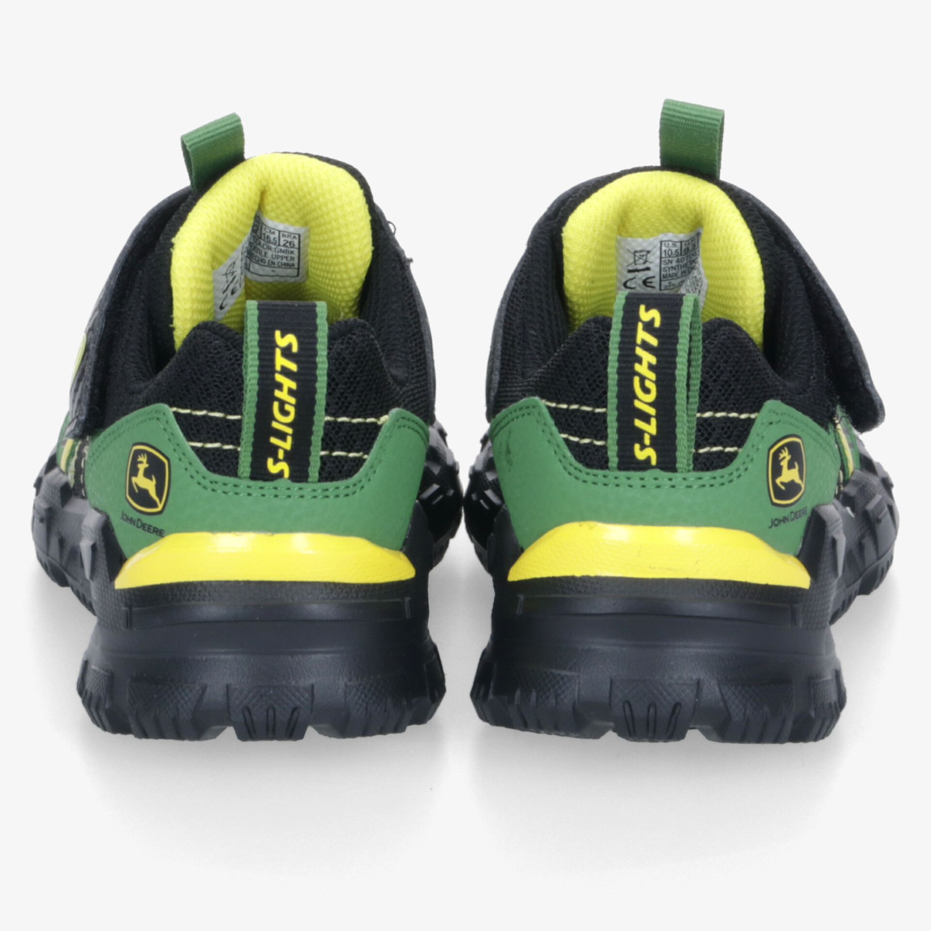 Rückansicht von schwarzen Sportschuhen mit grünen und gelben Akzenten, gepolstertem Schaft und robuster Sohle