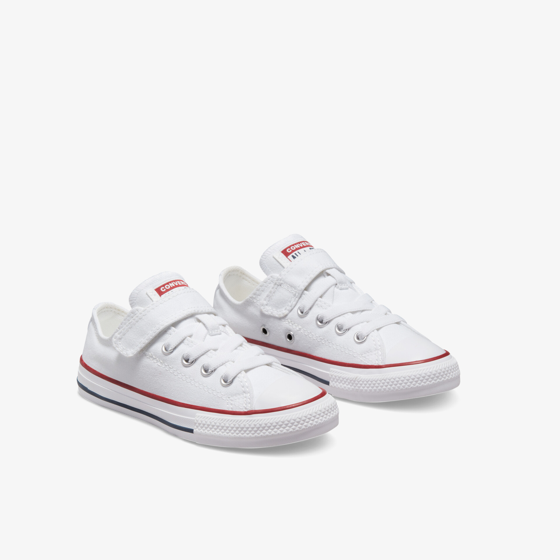 Weiße Sneaker mit klassischem Design und rotem Streifen, ideal für lässige Looks und täglichen Komfort.