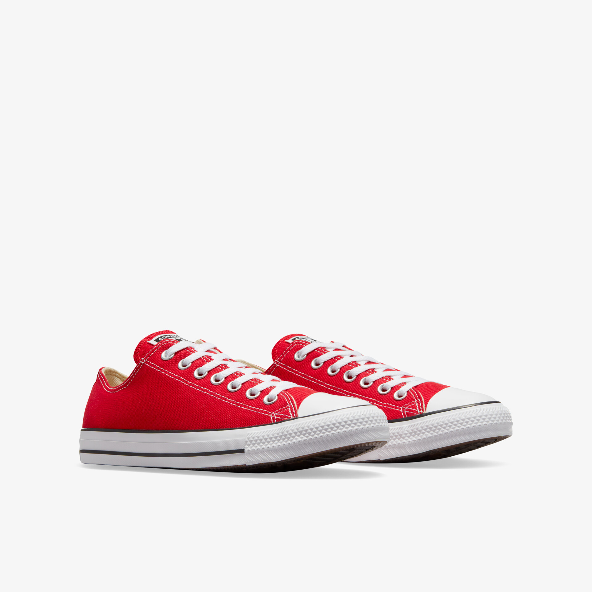 Rote Sneaker im Paar, sportlich und bequem mit weißer Sohle und Schnürsenkeln, ideal für den Alltag