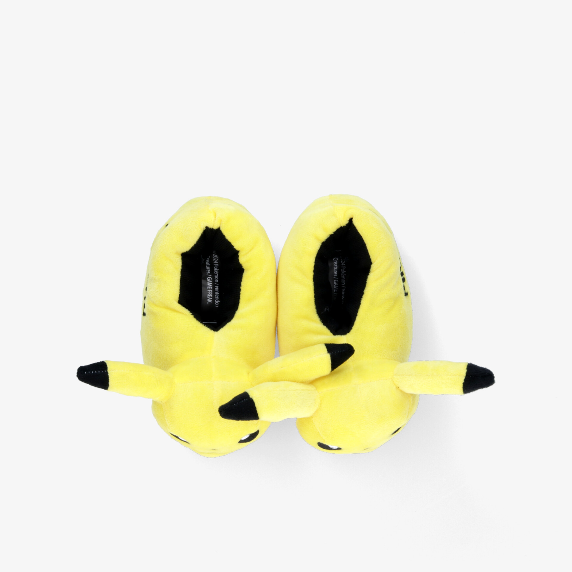 Weiche gelbe Plüschhausschuhe als Paar, komfortabel und warm für gemütliche Stunden