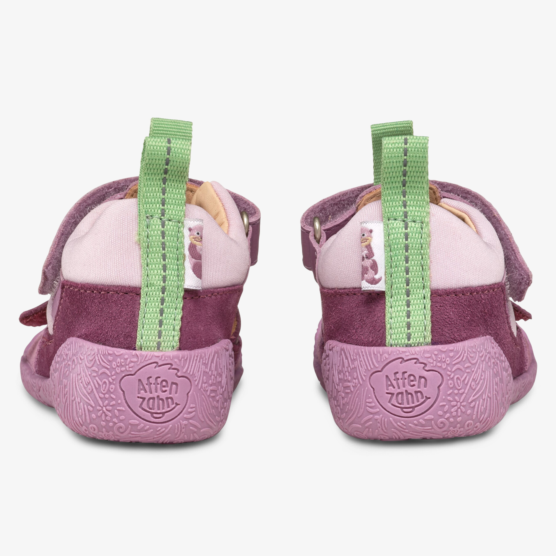 Rückansicht von robusten, bequem gepolsterten Schuhen mit rutschfester Sohle und praktischem grünen Zugband