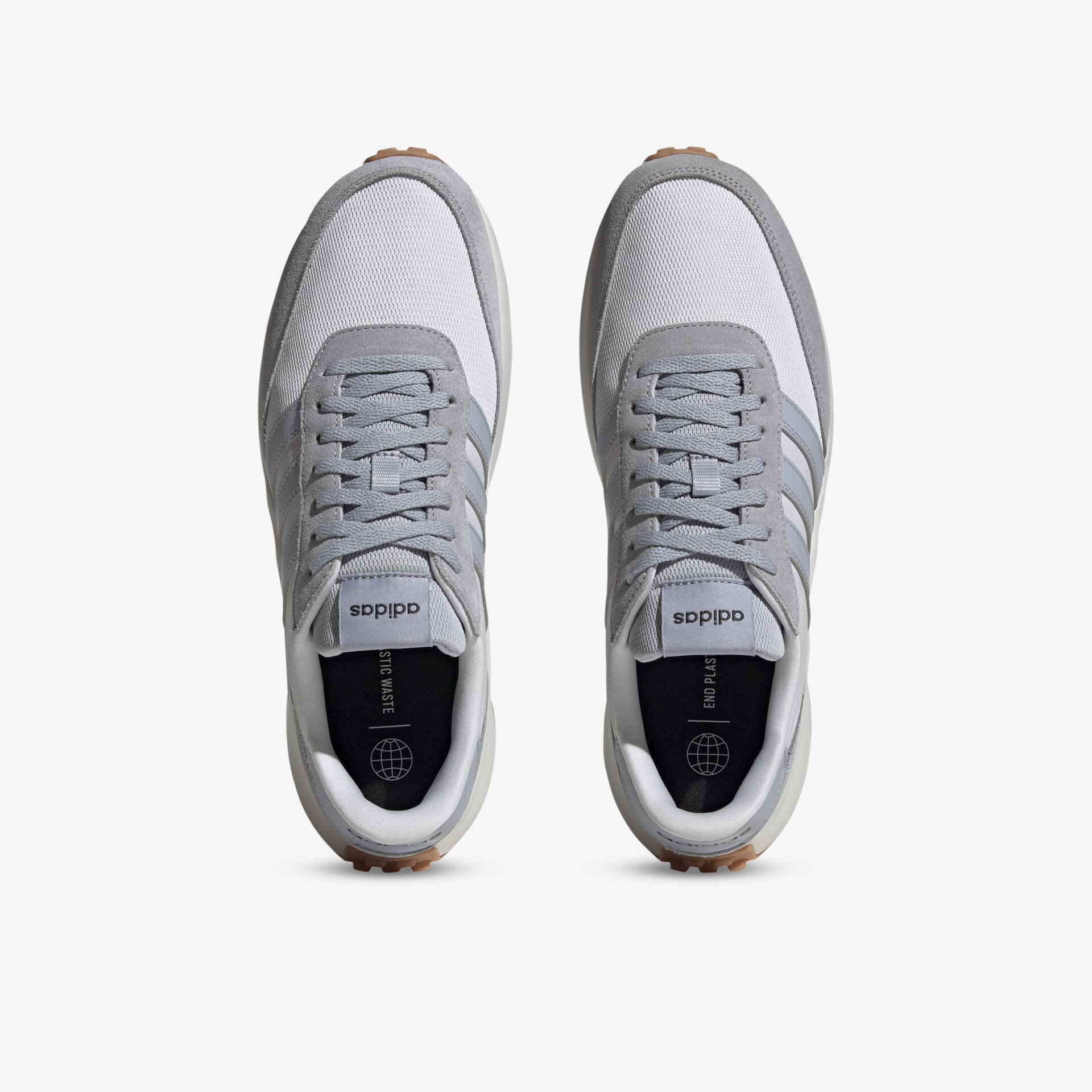 Moderne graue Sneakers mit hohem Tragekomfort und vielseitigem Design, ideal für Alltag und Freizeit.