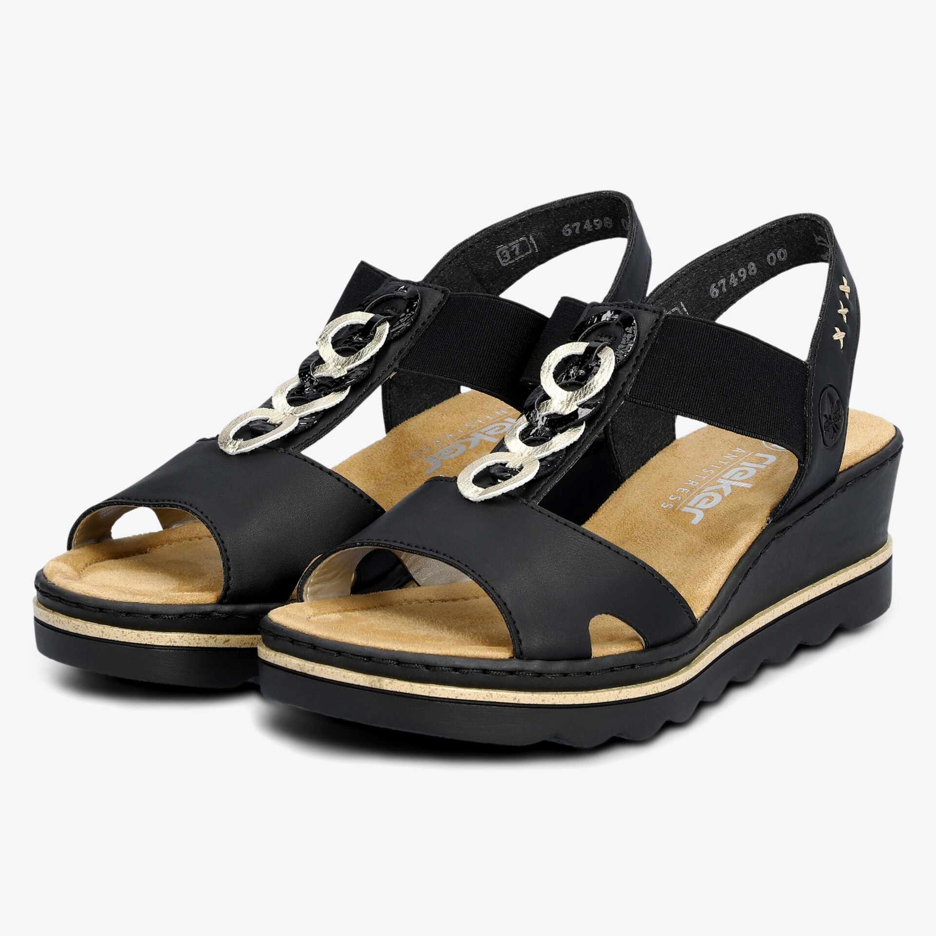 Schwarze Sandalen mit Metallringen, gepolstertem Fußbett und rutschfester Sohle für komfortablen Halt