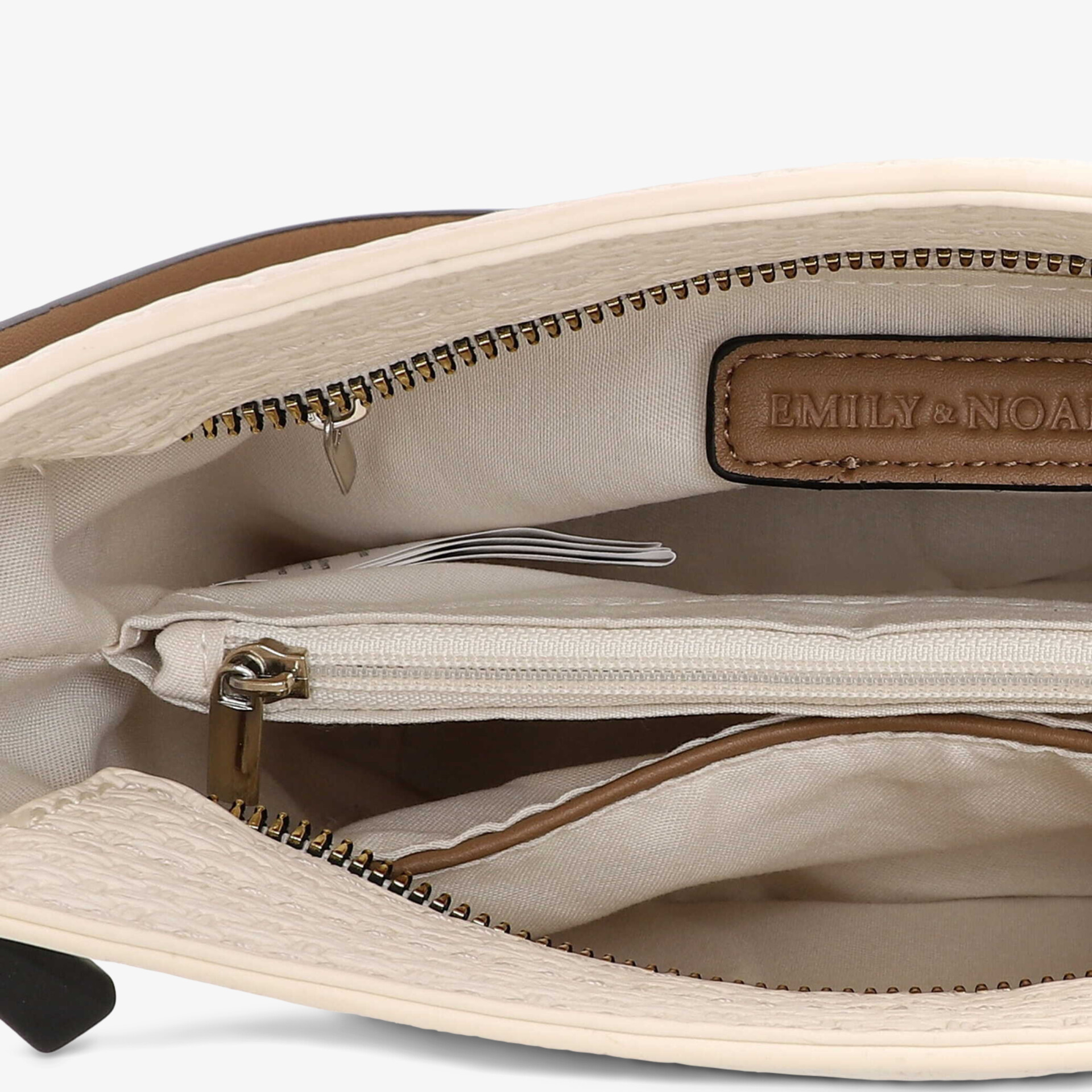 Innenansicht einer Tasche mit geräumigem Hauptfach und praktischem Reißverschlussfach für sichere Aufbewahrung