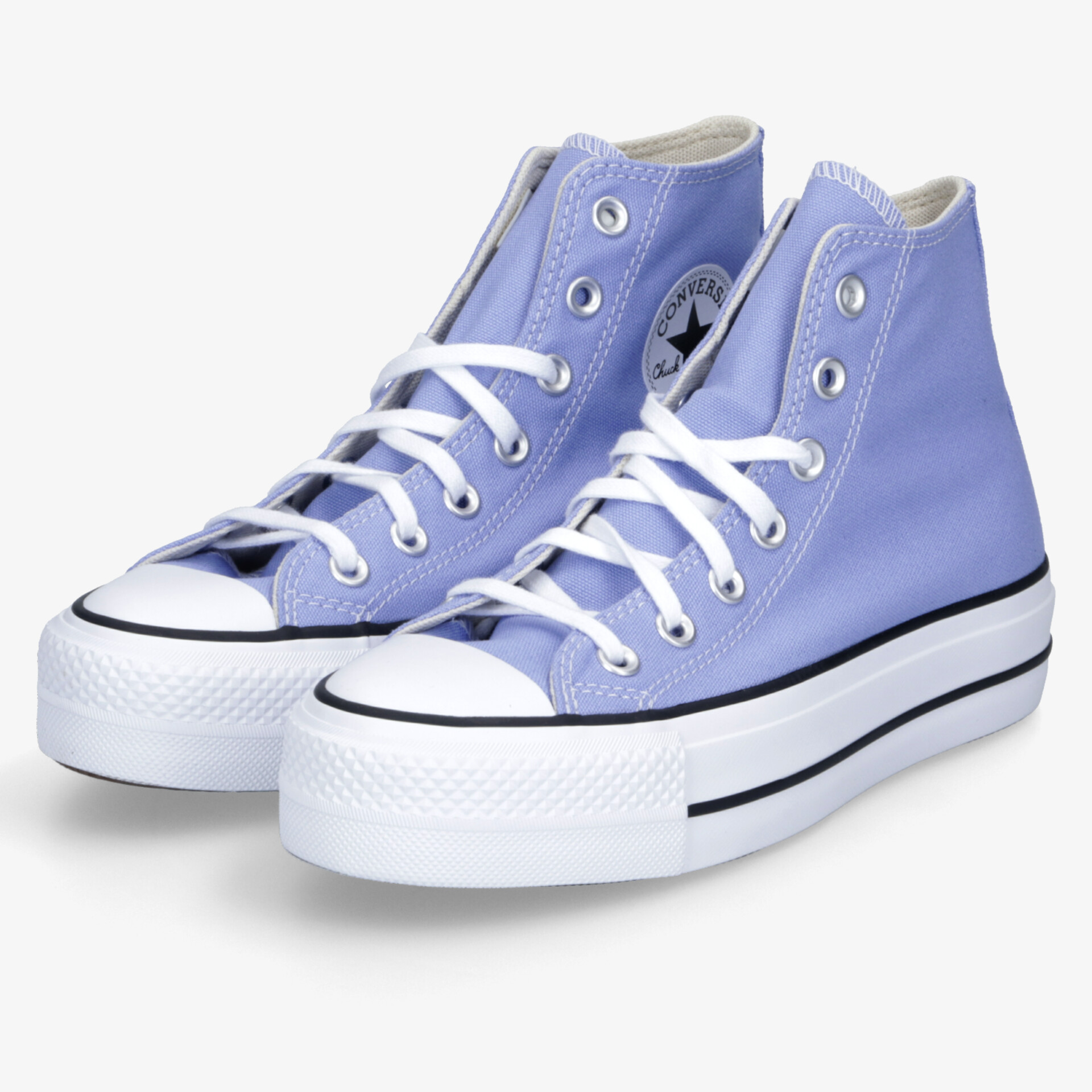 Stylische lila High-Top-Sneakers mit robustem Canvas-Obermaterial und markanter weißer Sohle.