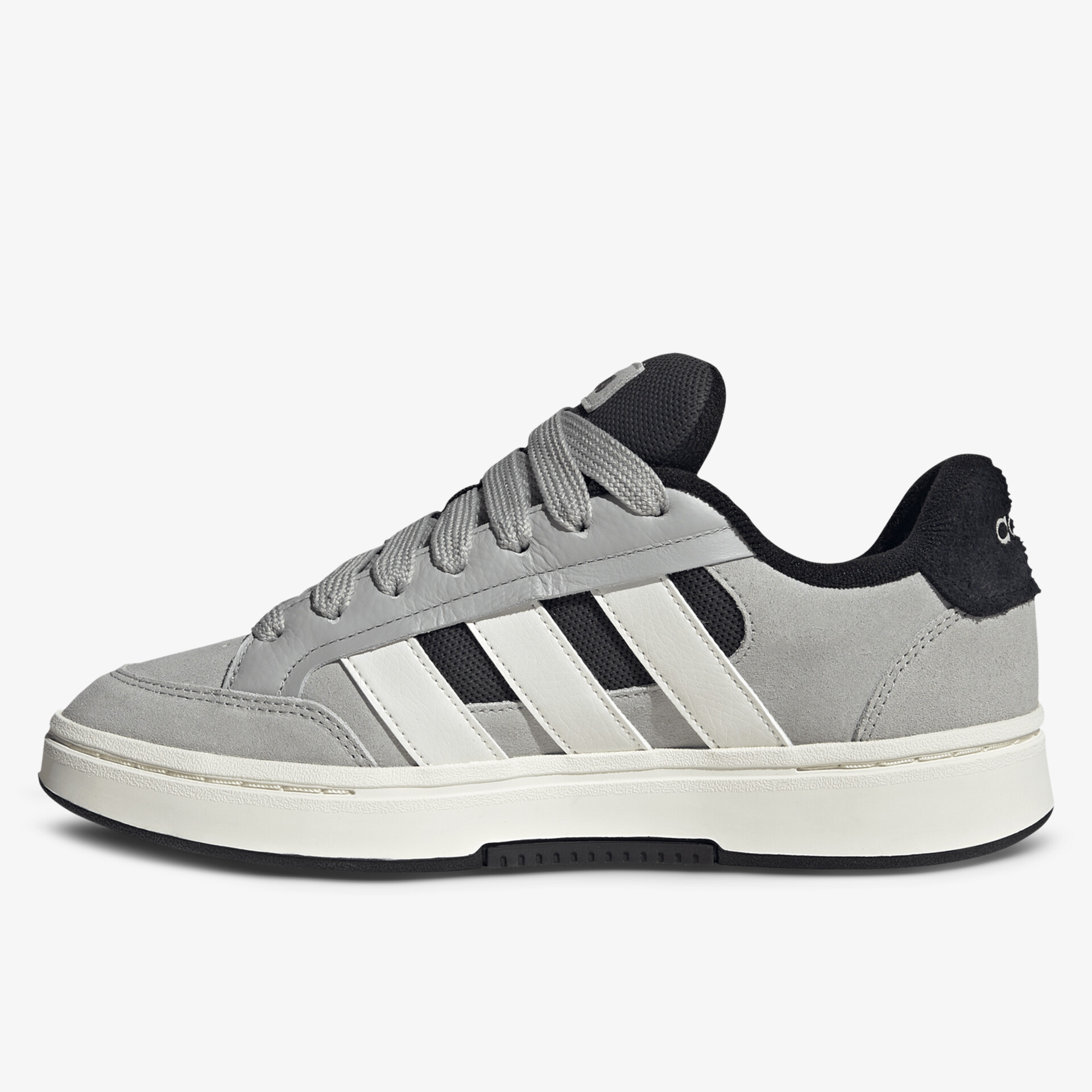 Grauer sportlicher Sneaker seitliche Ansicht mit bequemer Passform und weißer Sohle