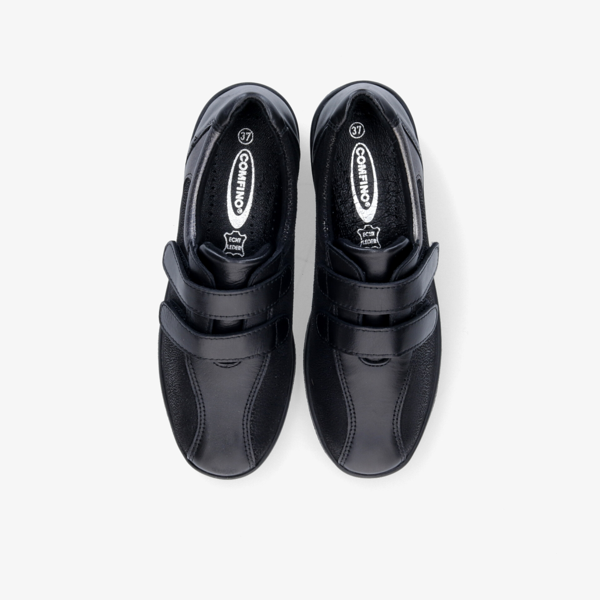 Bequeme schwarze Schuhe mit Klettverschluss und rutschfester Sohle; ideal für ganztägigen Tragekomfort.