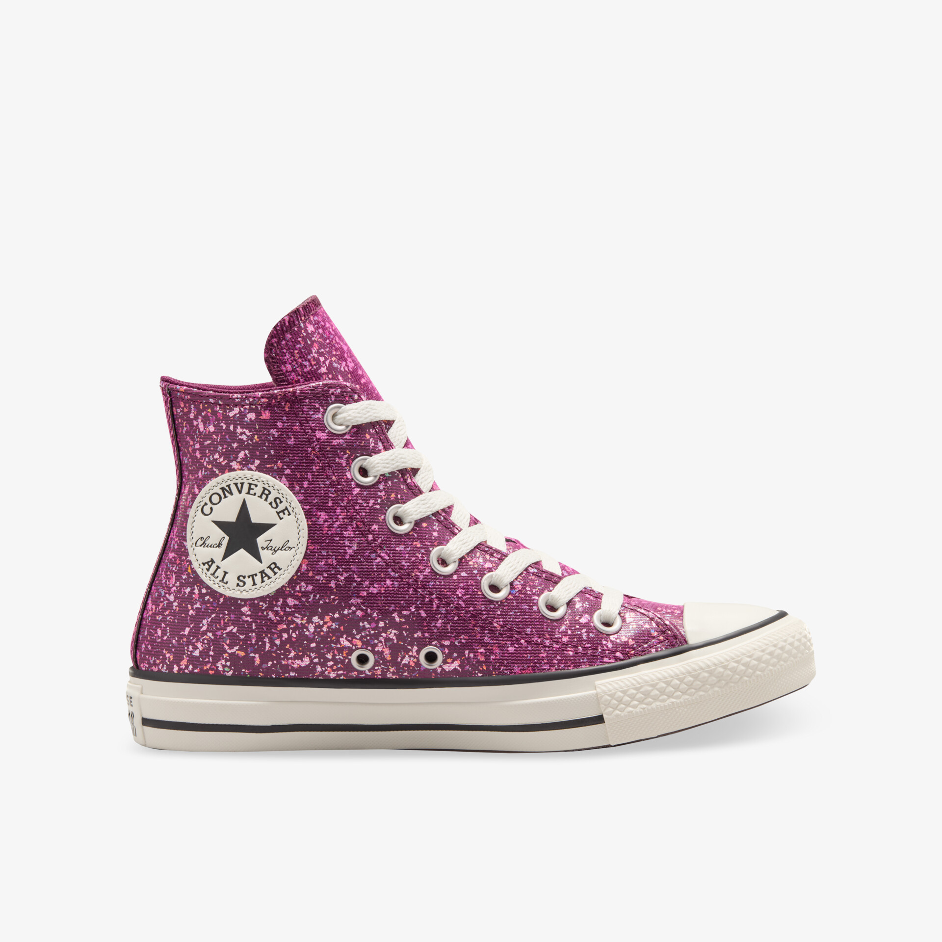 Seitliche Ansicht eines pinken glitzernden Sneakers mit weißer Gummisohle und Markenlogo für hohen Tragekomfort