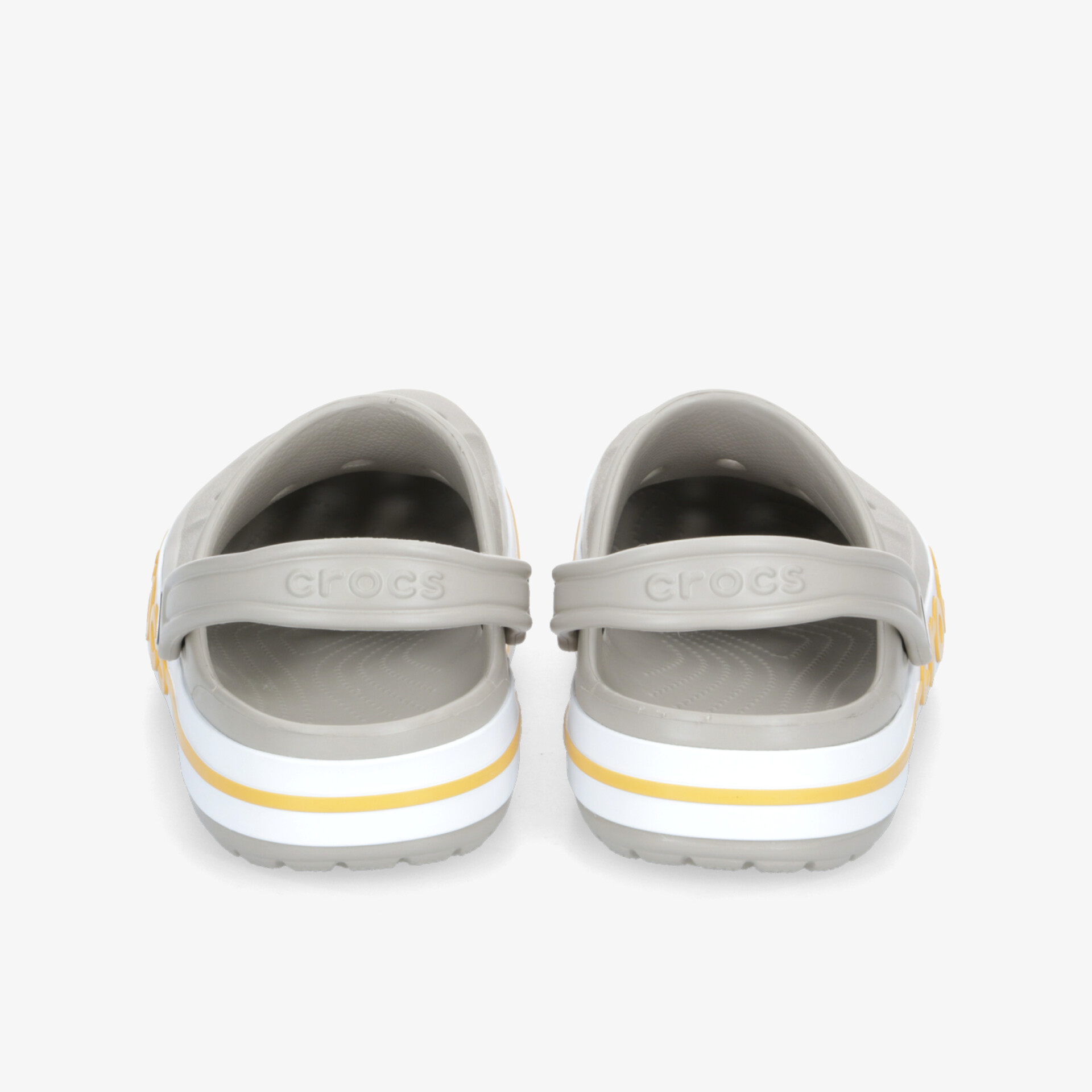 Paar graue Schuhe mit Klettverschluss, weißer Sohle und gelben Streifen, Rückansicht, bequem und praktisch
