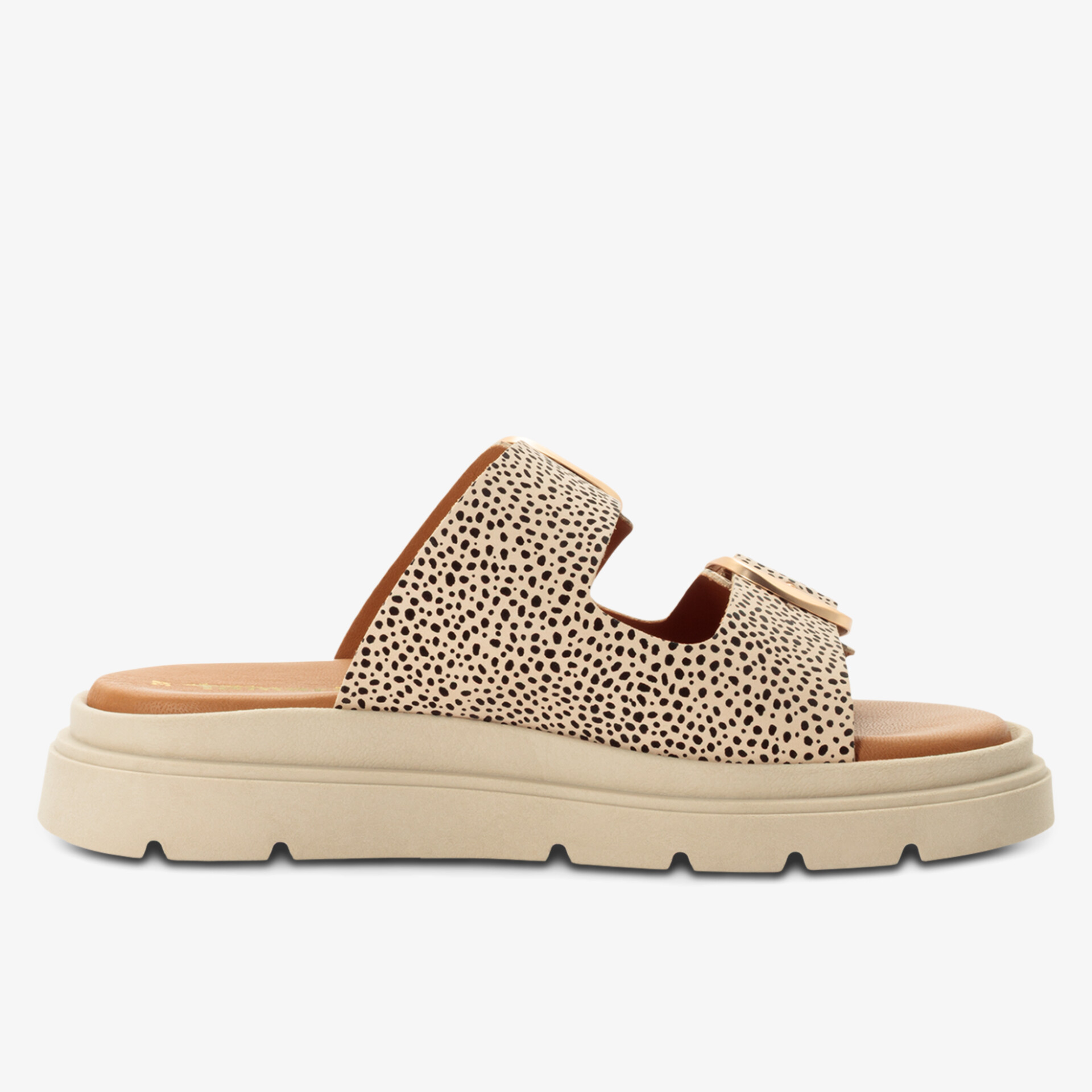 Moderner Slide mit gepunktetem Muster und bequemer Sohle, ideal für warme Tage.