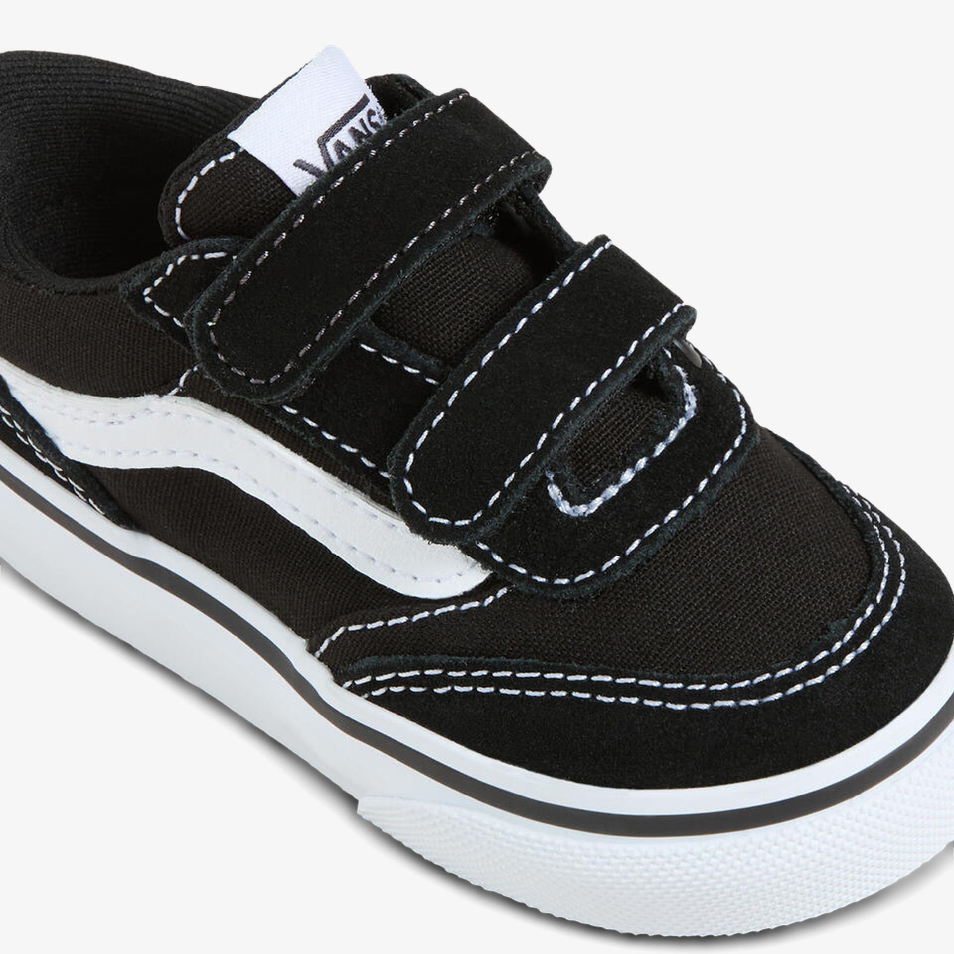 Schwarzer Kindersneaker mit weißer Akzentlinie und praktischem Klettverschluss für sicheren Halt
