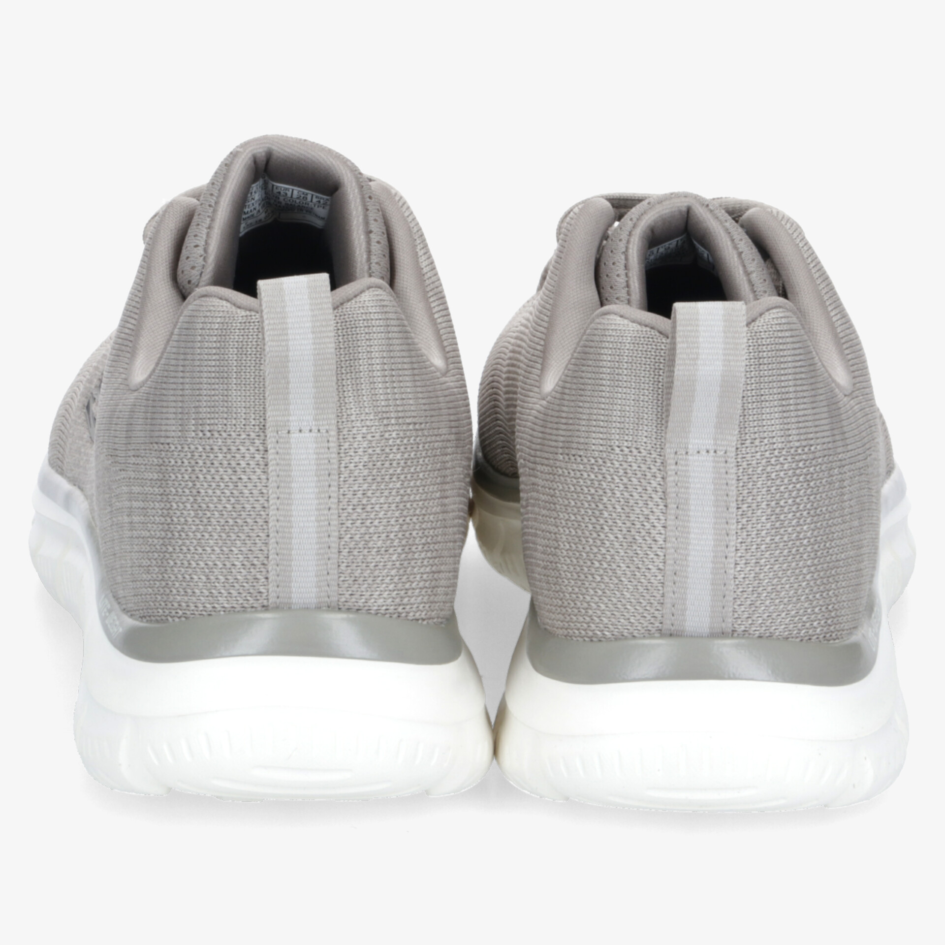 Rückansicht eines Paares leichter grauer Sportschuhe mit flexiblem und rutschfestem Profil