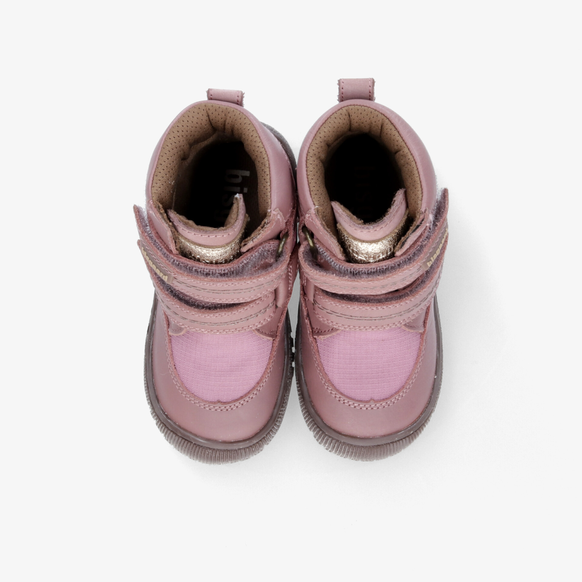 Rosa Schuhe mit robustem Material und praktischen Klettverschlüssen, gepolstert und rutschfest für sicheren Halt