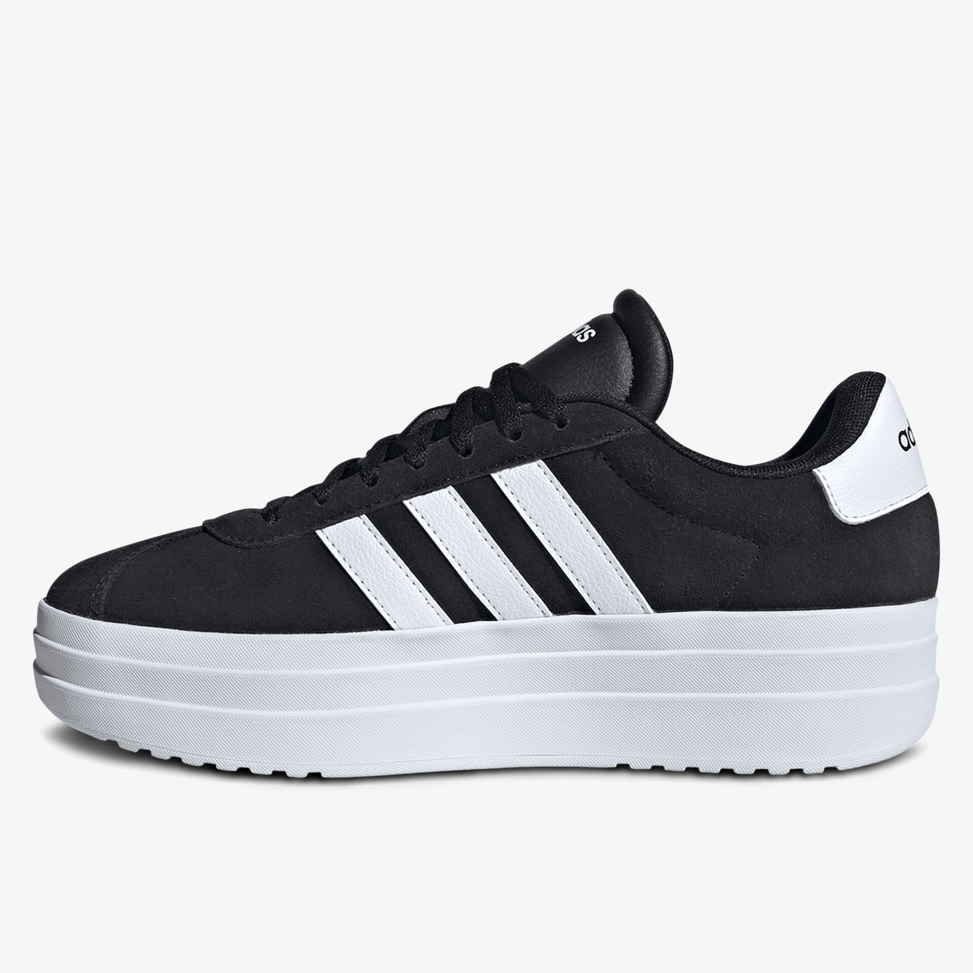 Schwarzer Schuh mit weißer Plateausohle und Streifen, sportlich und bequem, seitliche Ansicht