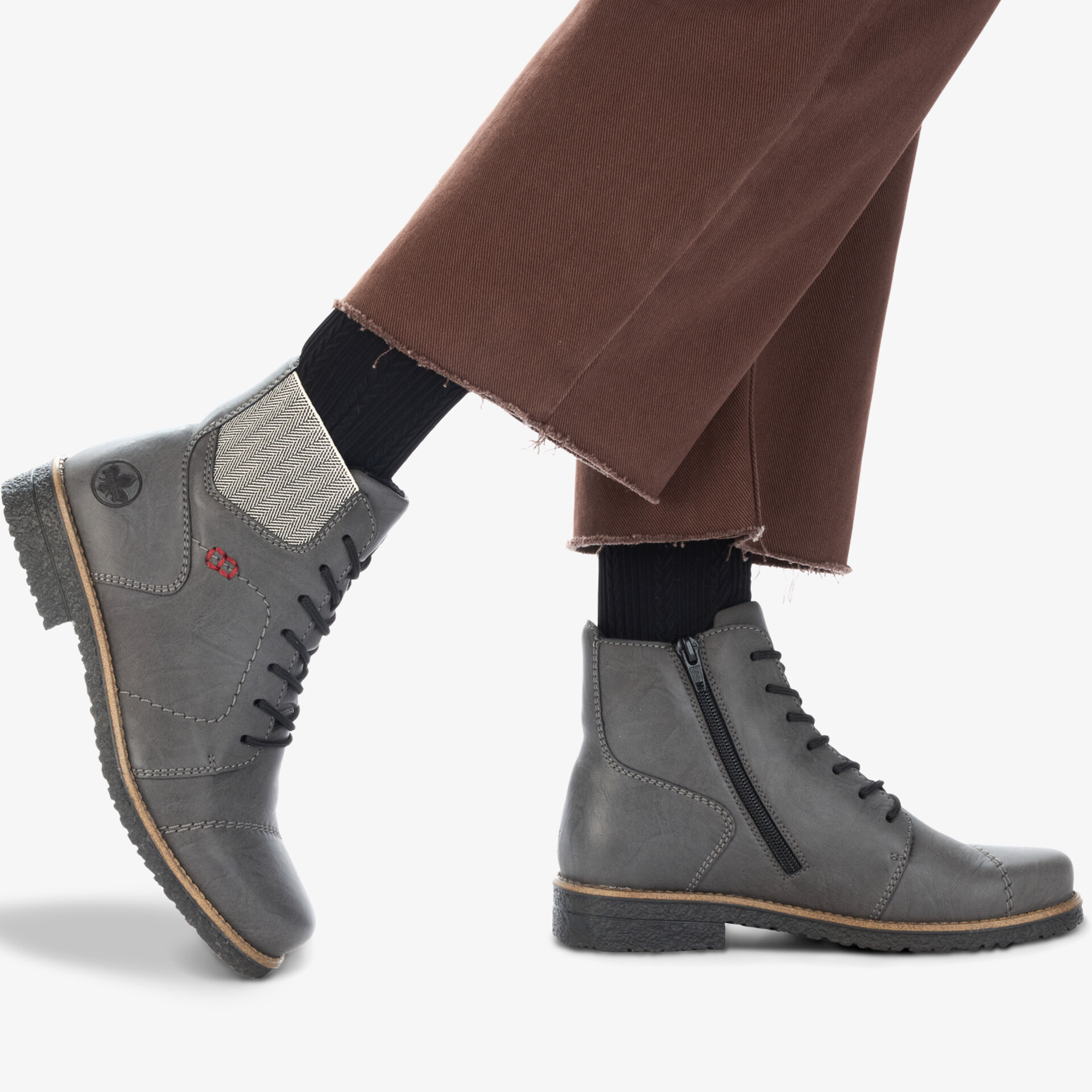 Grauer Stiefel mit Reißverschluss und Schnürung, rutschfeste Sohle, eleganter und robuster Schuh