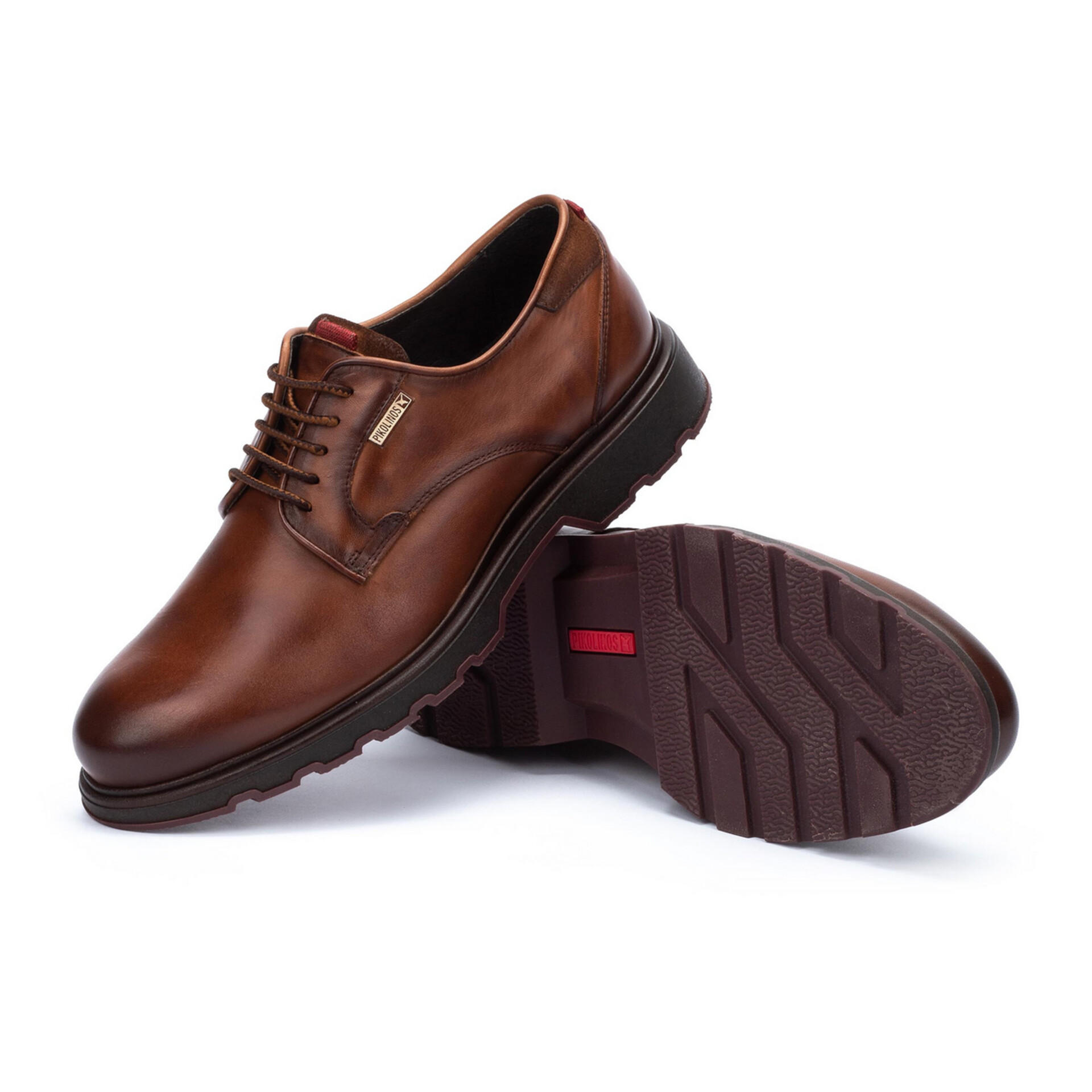 Klassische braune Lederschuhe mit rutschfester Sohle und komfortabler Passform für elegante Anlässe.