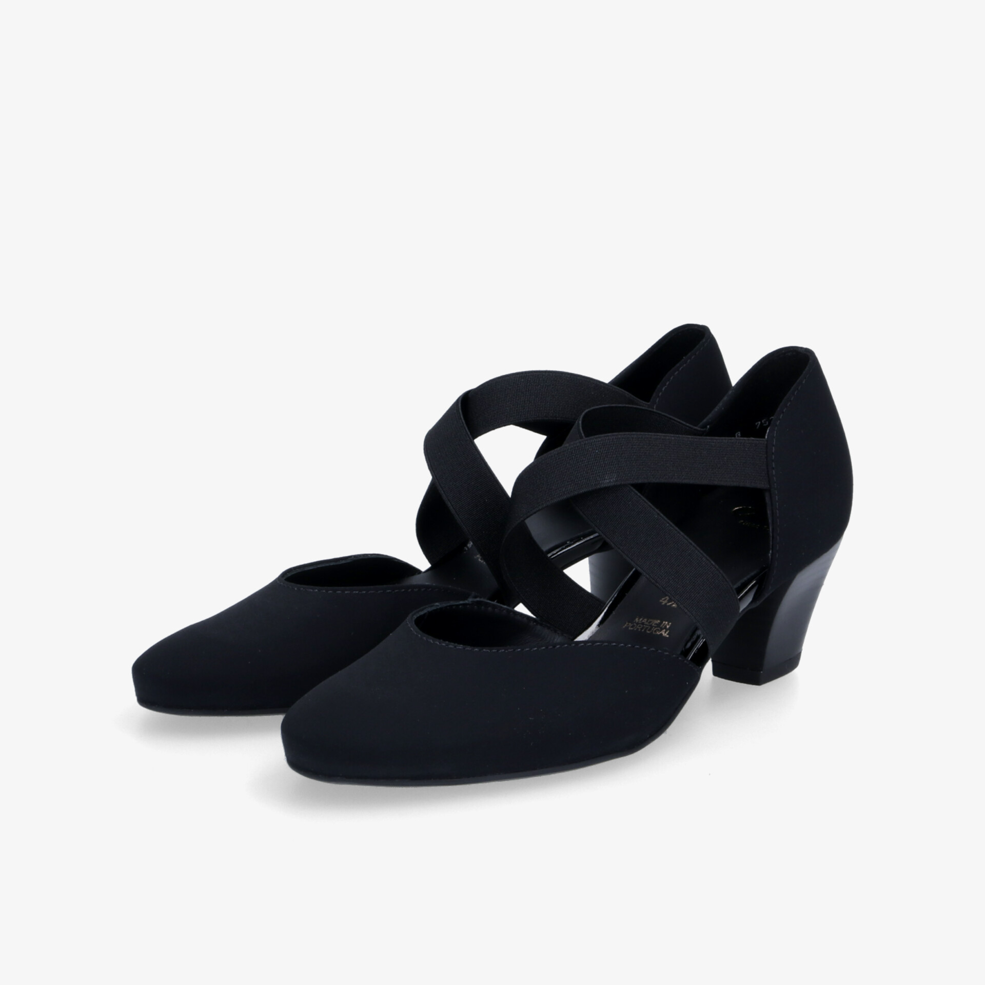 Schwarze Schuhe mit elastischen Riemen und stabilem Absatz, bieten Komfort und modernen Look.