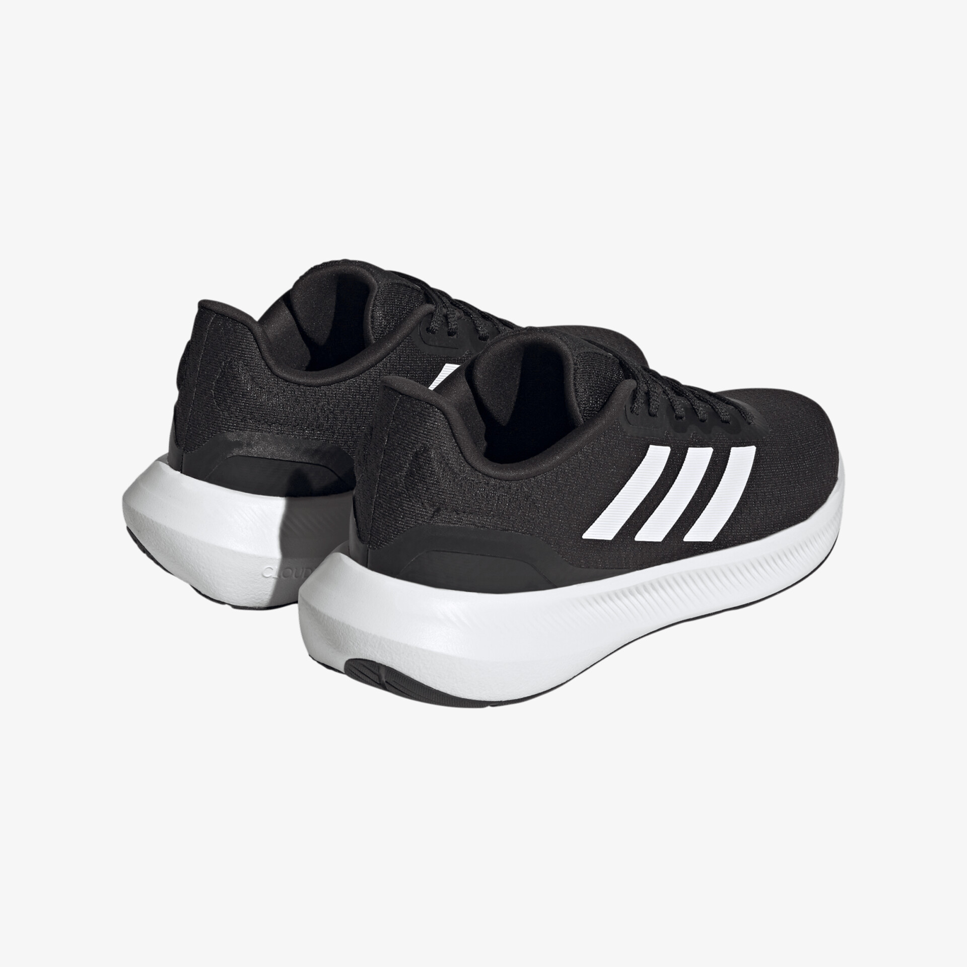 Stylische schwarze Sportschuhe mit weißem Streifenmuster und bequemer Sohle.