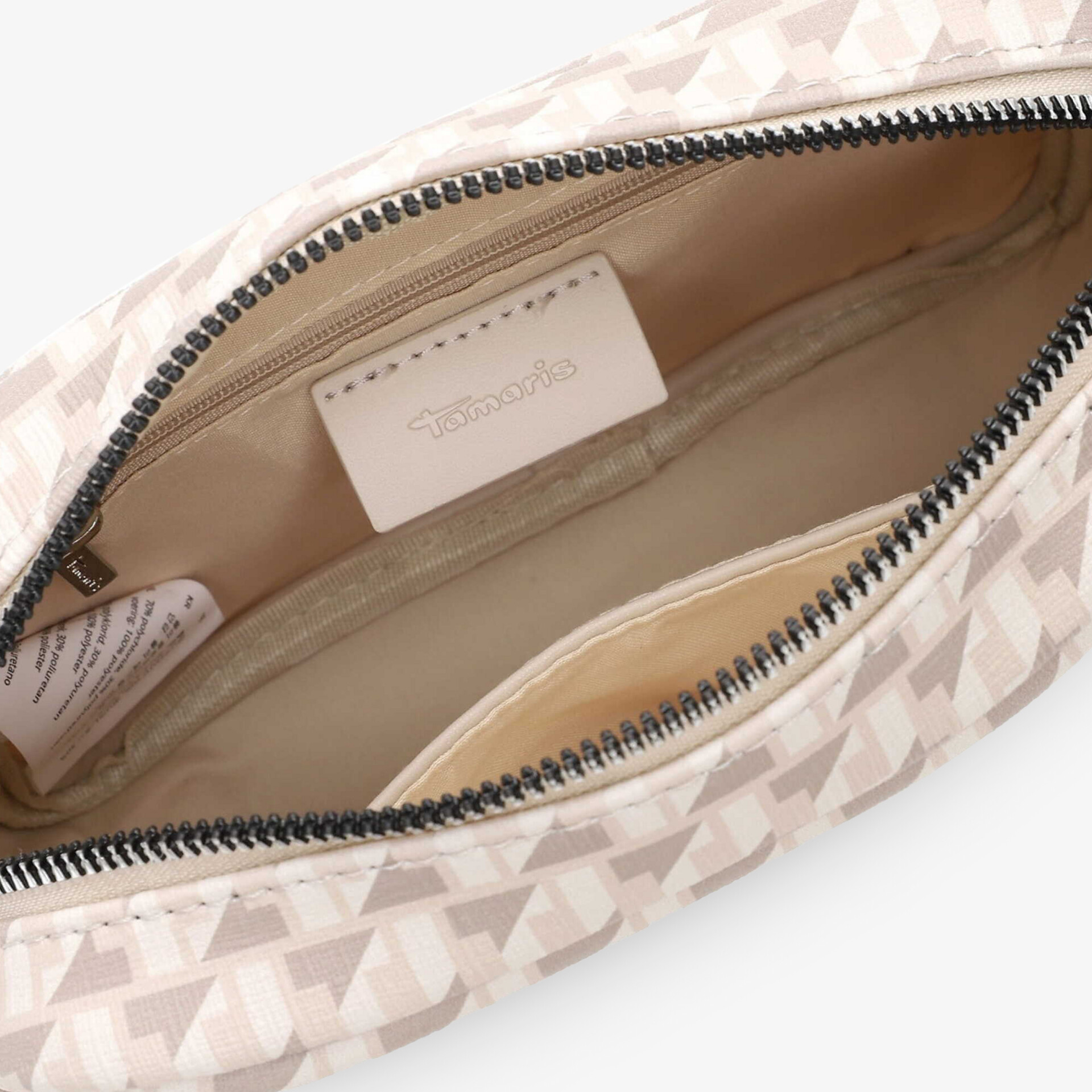 Detailaufnahme geöffnetes Innenfach mit Reißverschluss, geräumig und sauber verarbeitet, modernes Muster