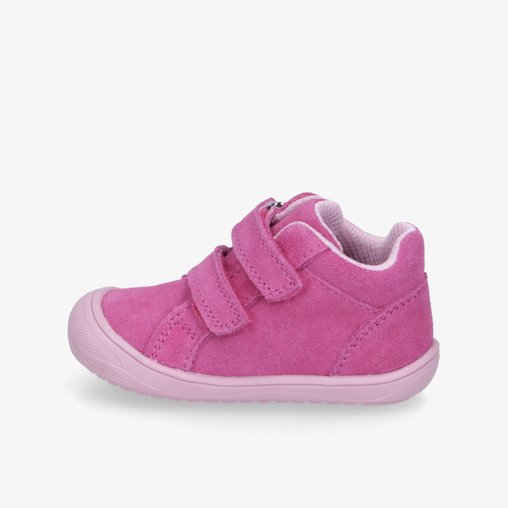 Seitliche Ansicht eines rosa Kinder-Sneakers mit weichem Material und praktischem Klettverschluss für einfachen Halt
