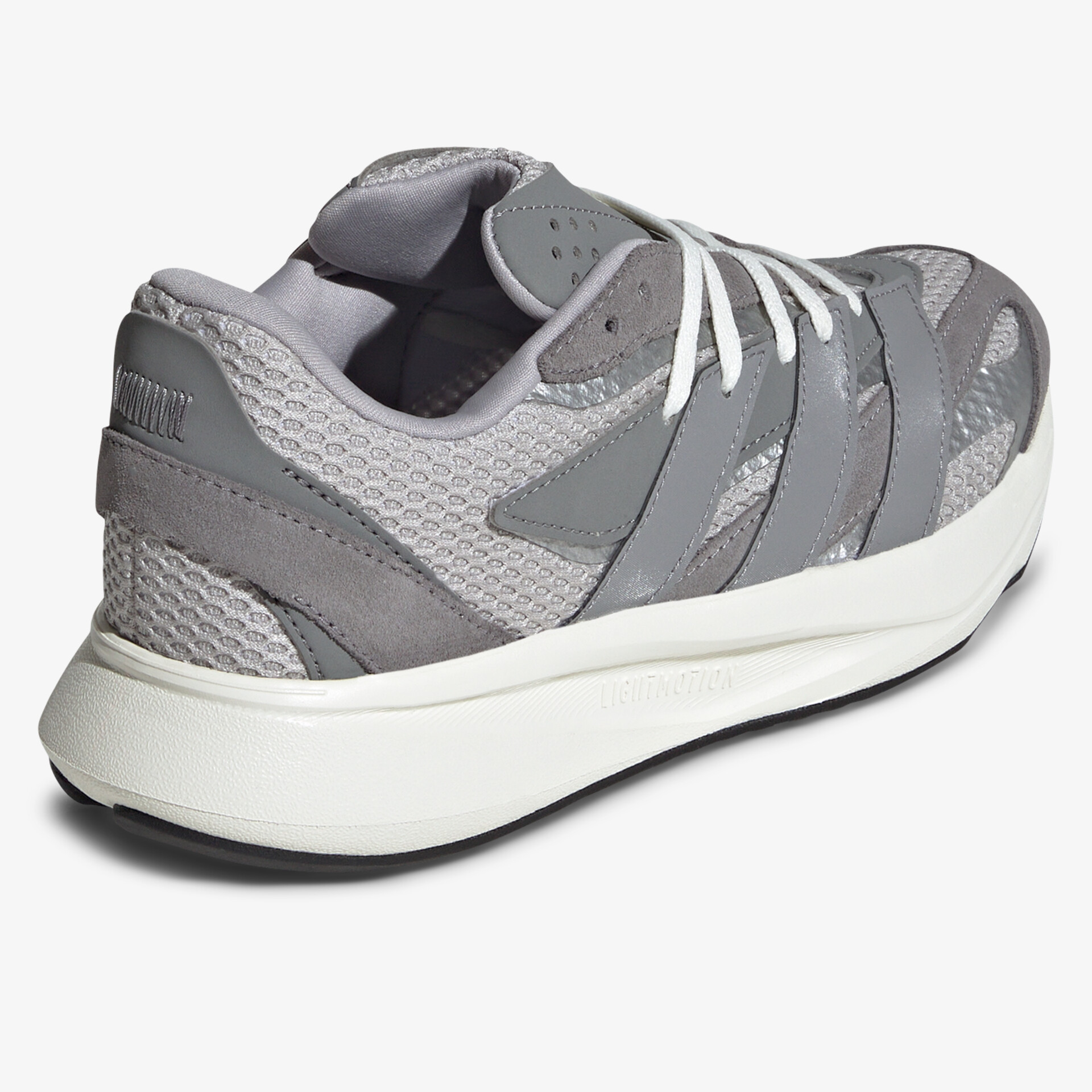 Moderner grauer Sneaker mit atmungsaktivem Material und bequemer Passform, sorgt für Komfort bei jedem Schritt