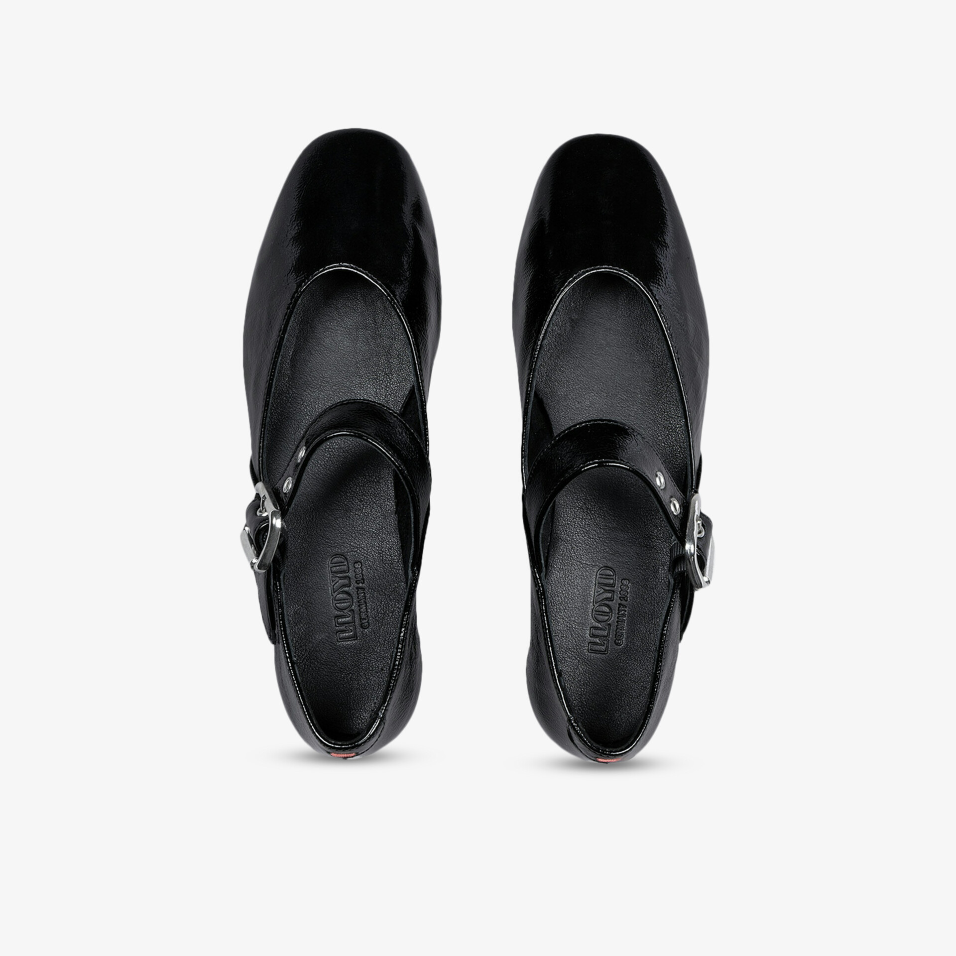 Schwarzes Paar Schuhe mit verstellbarem Riemen und komfortabler Passform für sicheren Halt und eleganten Look