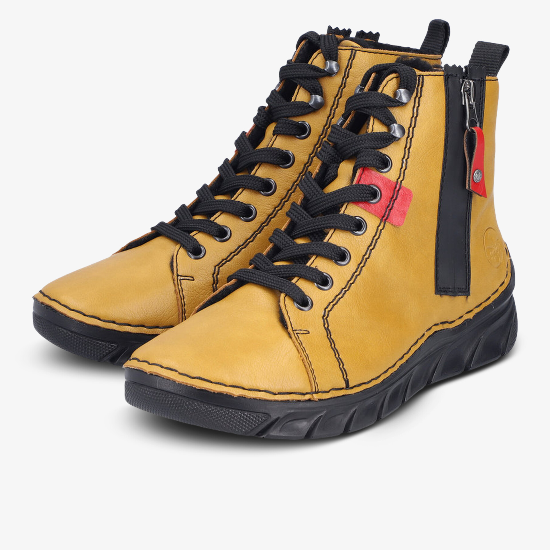 Modische gelbe Schuhe mit seitlichem Reißverschluss und robuster, profilierter Sohle