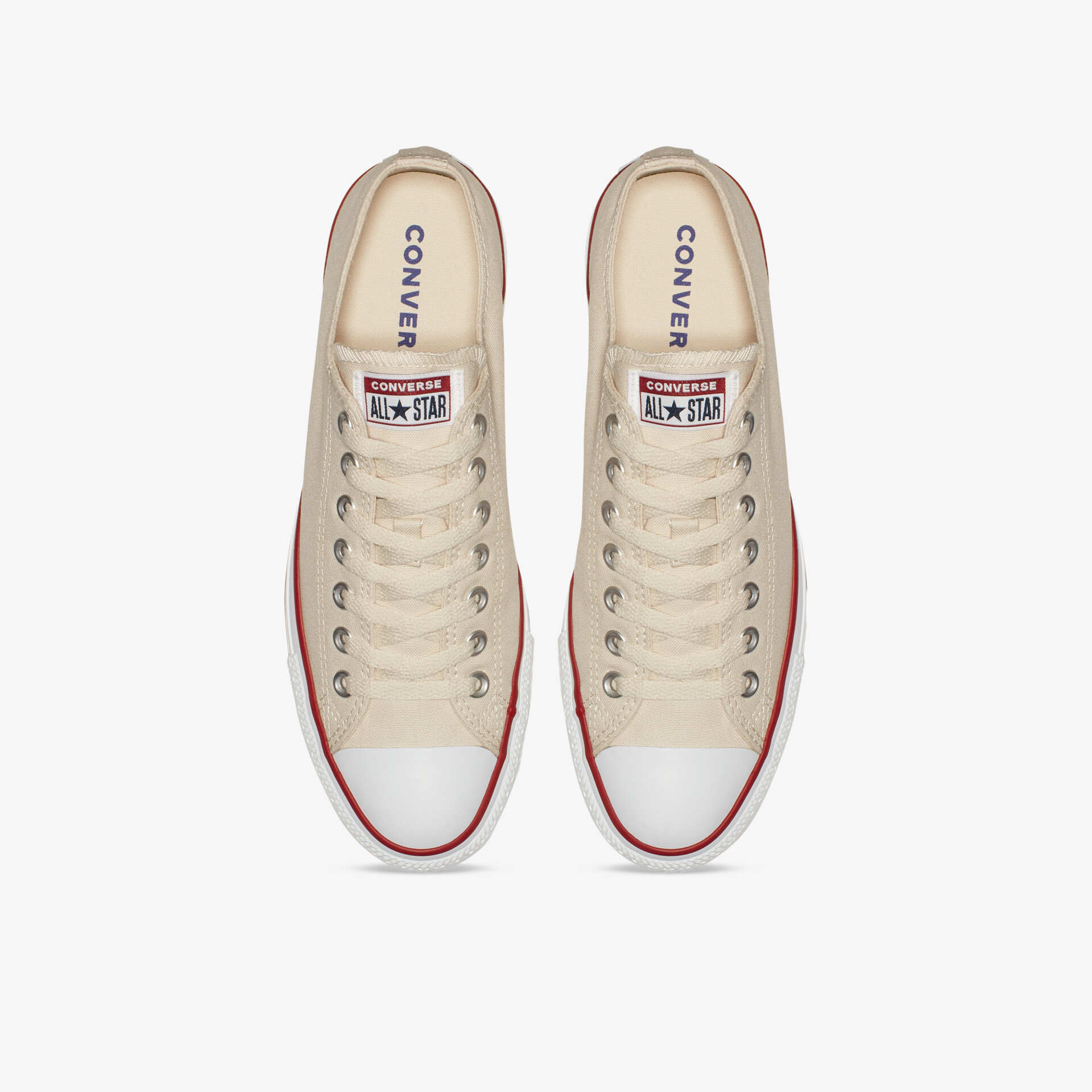 Klassische beige Sneaker mit weißer Kappe und rotem Rand. Vielseitig und komfortabel für den Alltag.