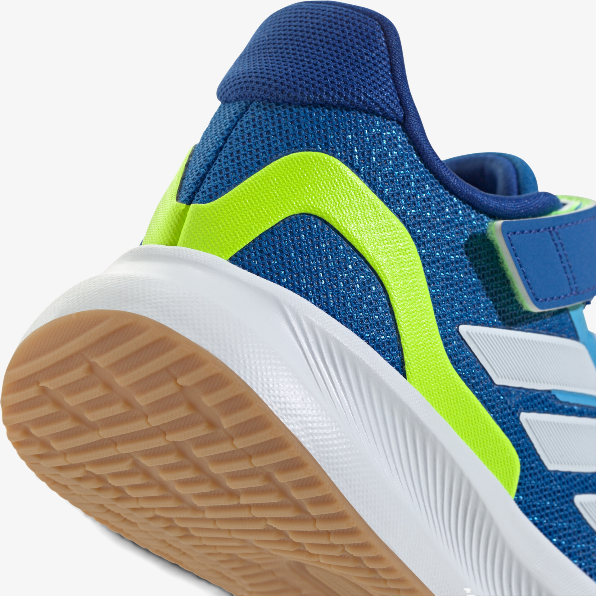 Sportlicher Schuh mit rutschfester Gummisohle und bequemem Klettverschluss in leuchtendem Design