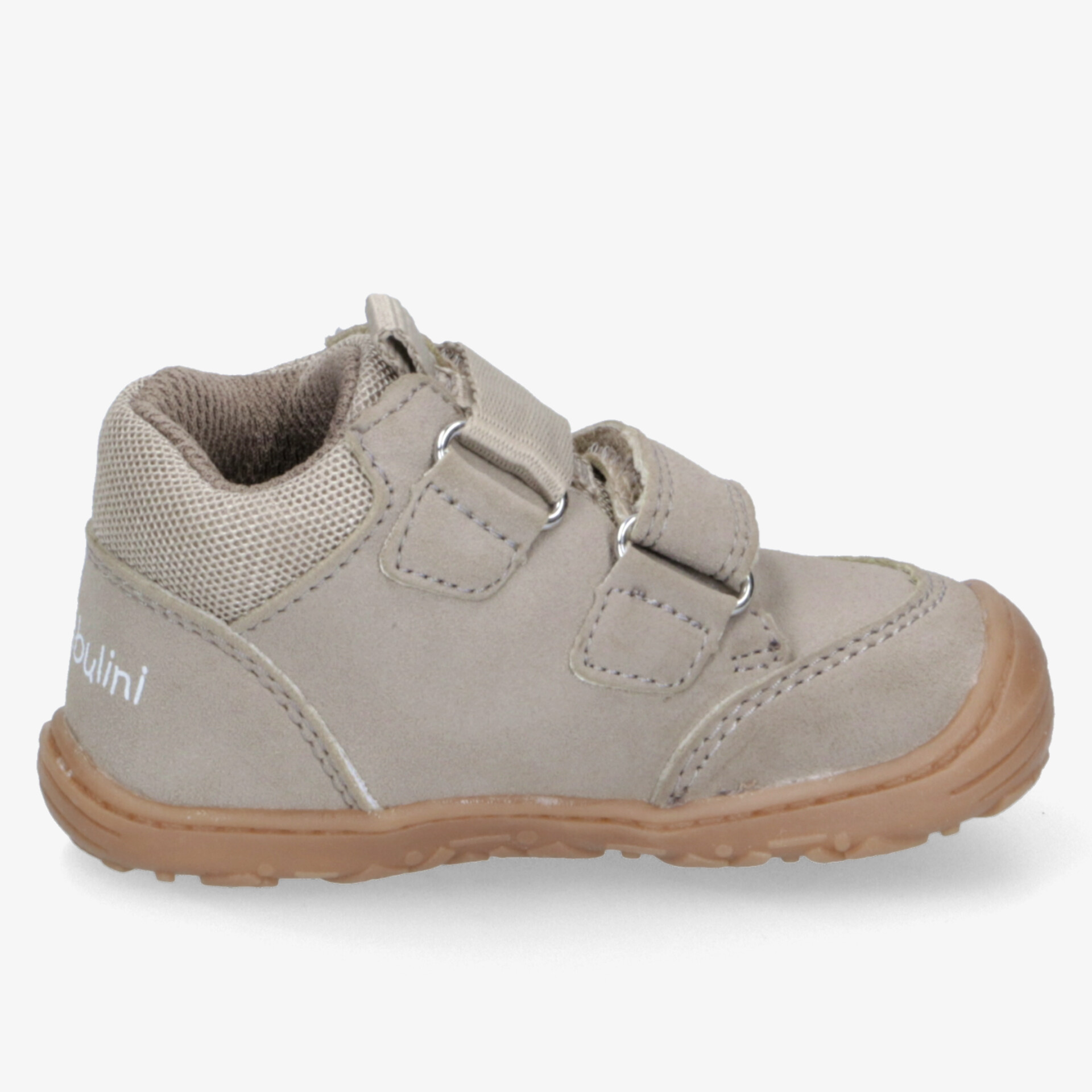 Beiger Kinderschuh mit praktischem Klettverschluss und stabiler Sohle, ideal für jeden Tag.