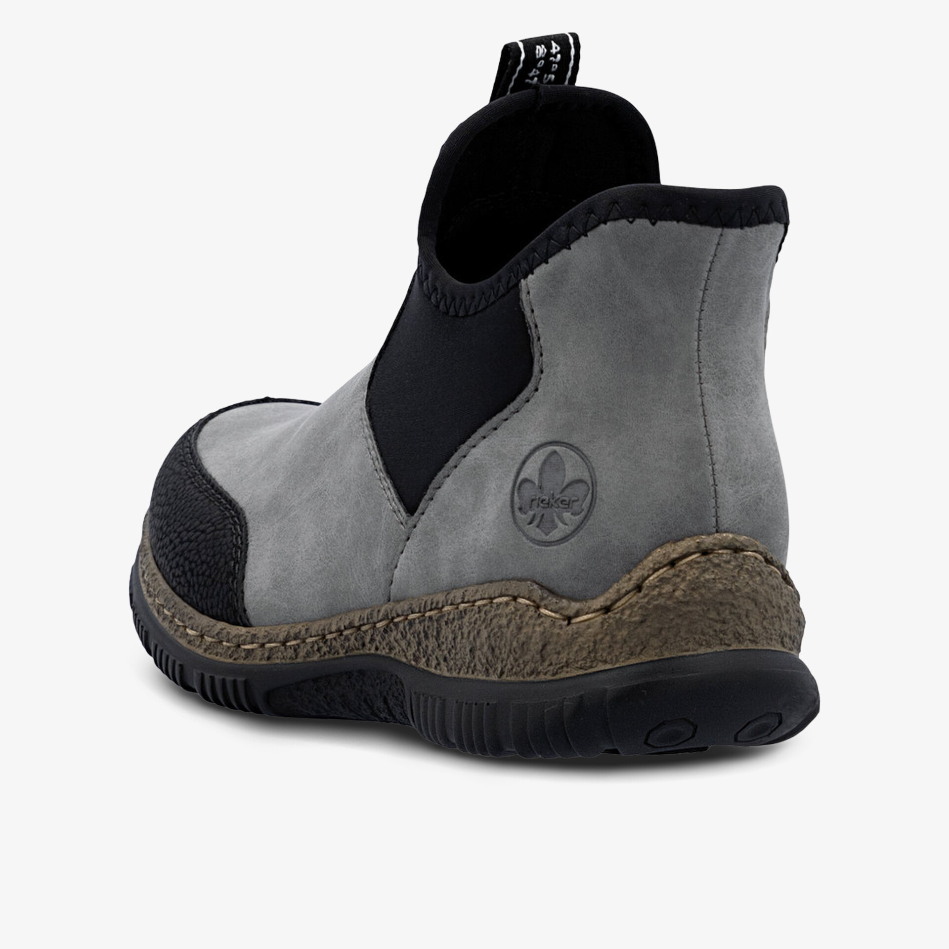 Robuster grauer Schuh mit elastischem Einsatz und profilierter rutschfester Sohle, ideal für Alltag