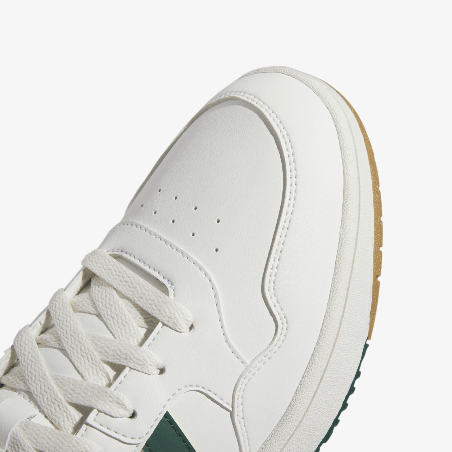 Moderner weißer Sneaker aus Leder mit Schnürsenkeln und stilvoller Schnittführung.