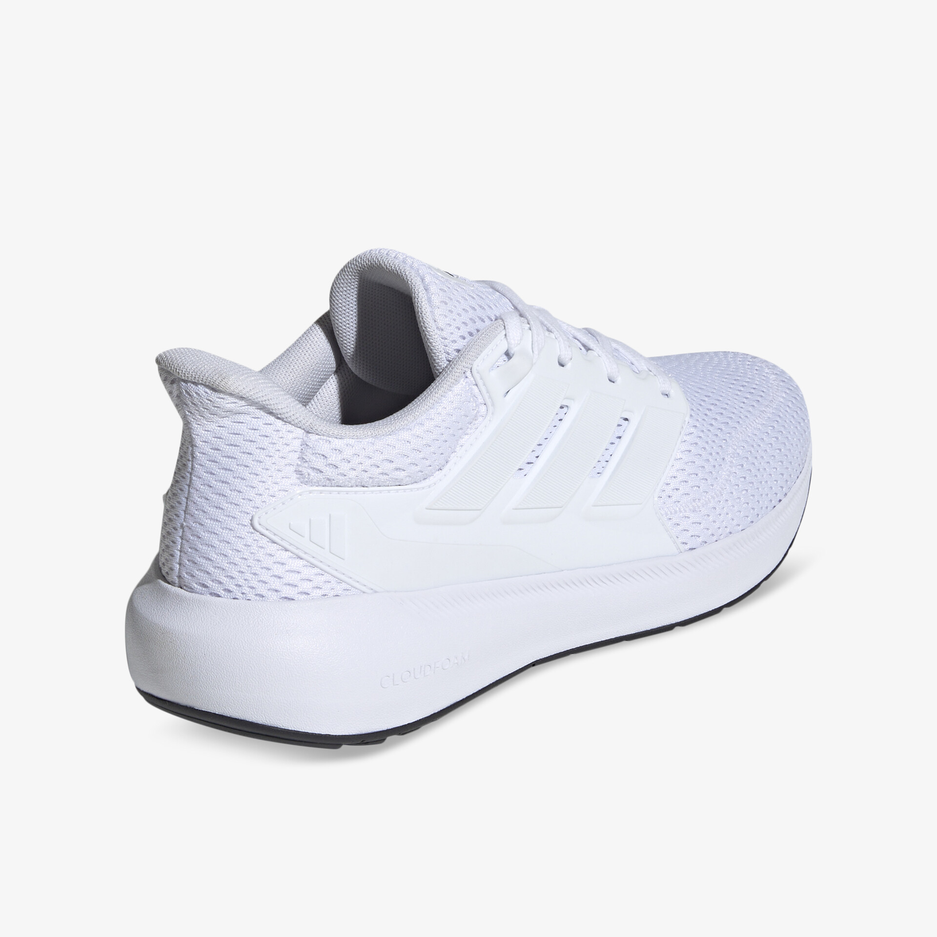 Weißer Sneaker mit gepolstertem Einstieg und flexiblem Sohlenprofil, seitlich hinten sichtbar