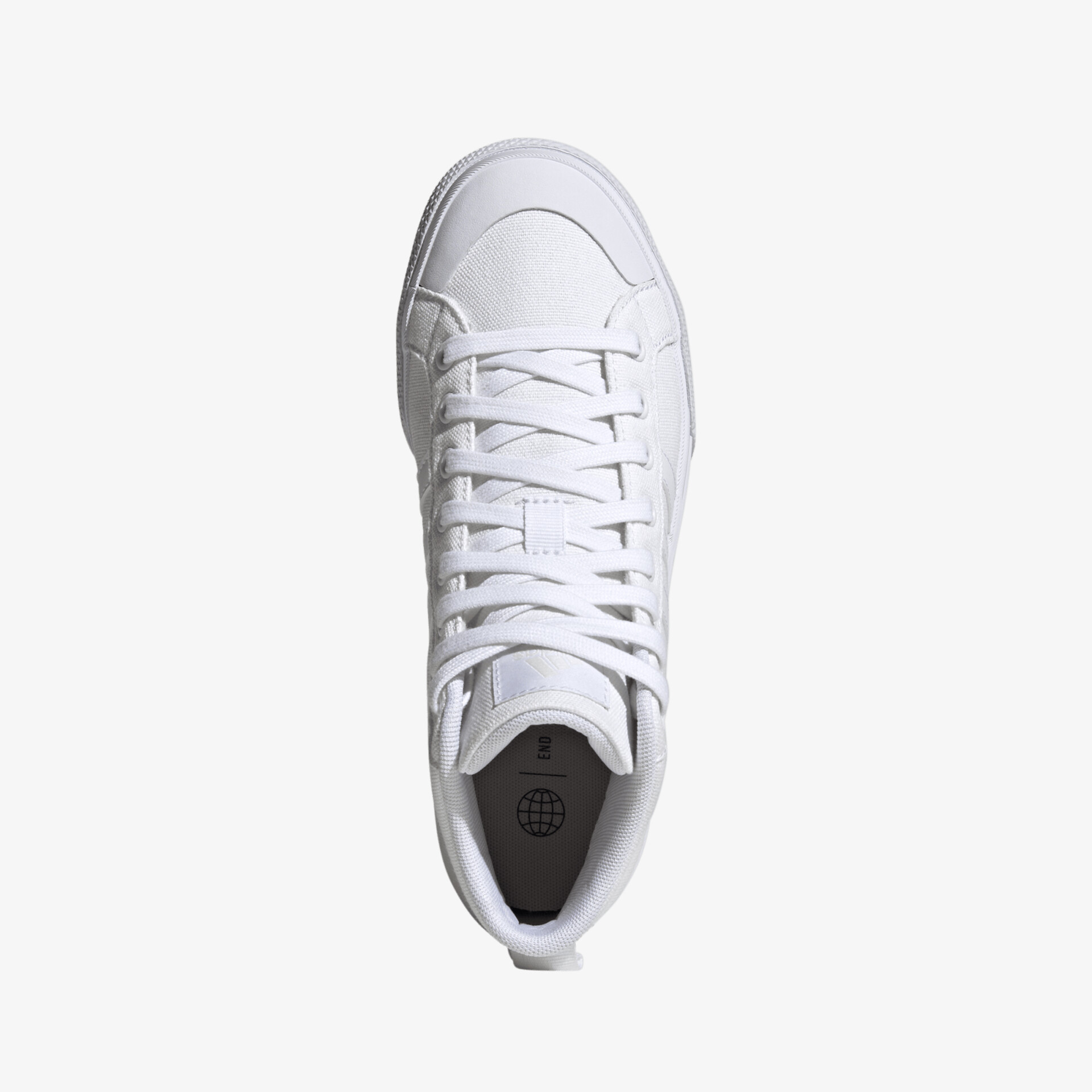 Moderner weißer Sneaker von oben betrachtet mit glattem Design und stilvollem Schnürsystem.