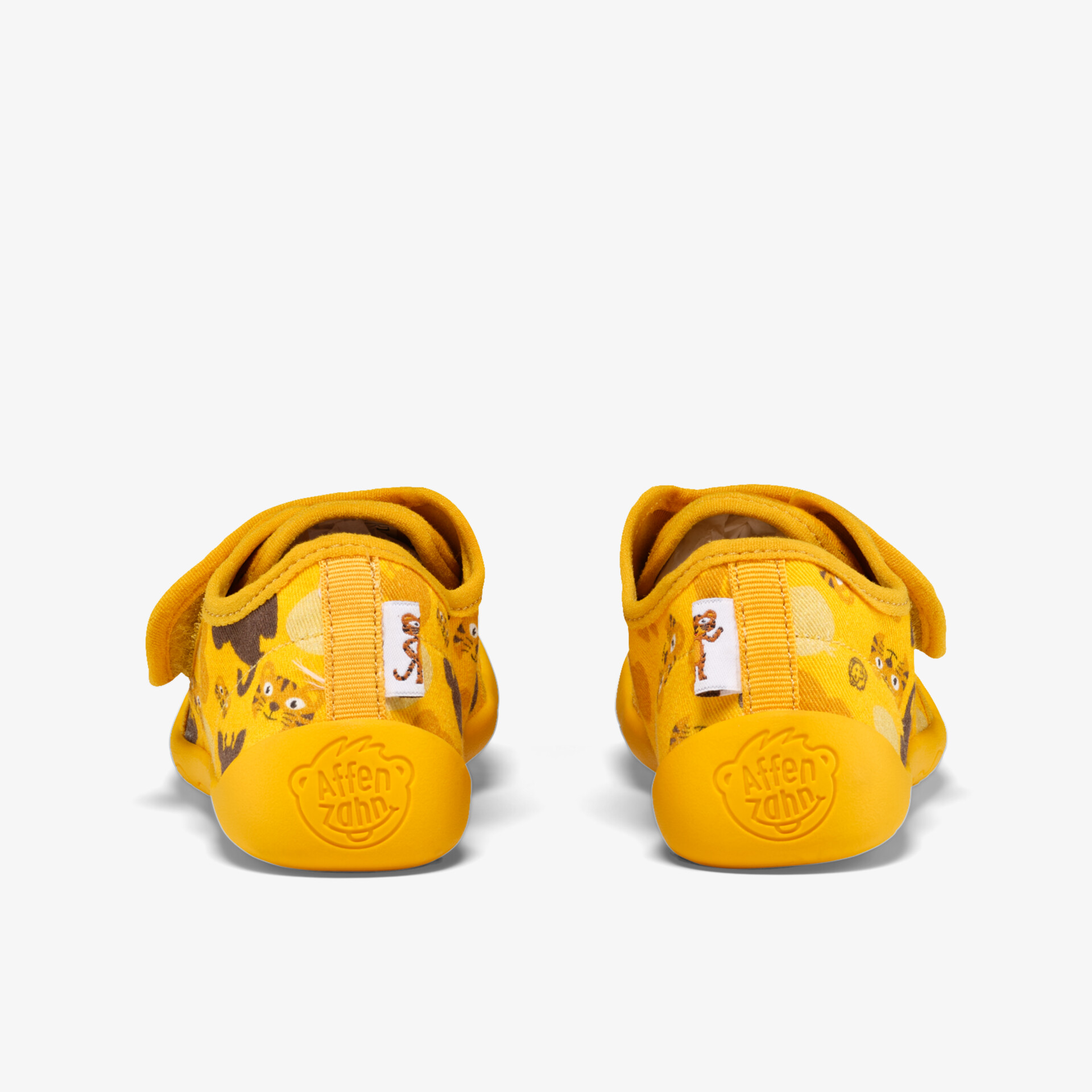 Gelbe Kinderschuhe mit Klettverschluss, weich und flexibel, bequem und rutschfest für sicheren Halt
