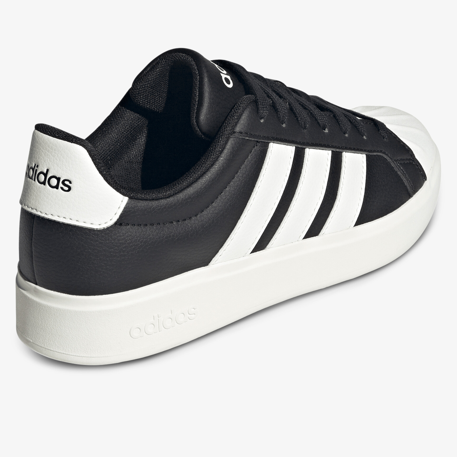 Schwarzer und weißer Adidas Sneaker mit klassischem Design und bequemer Passform