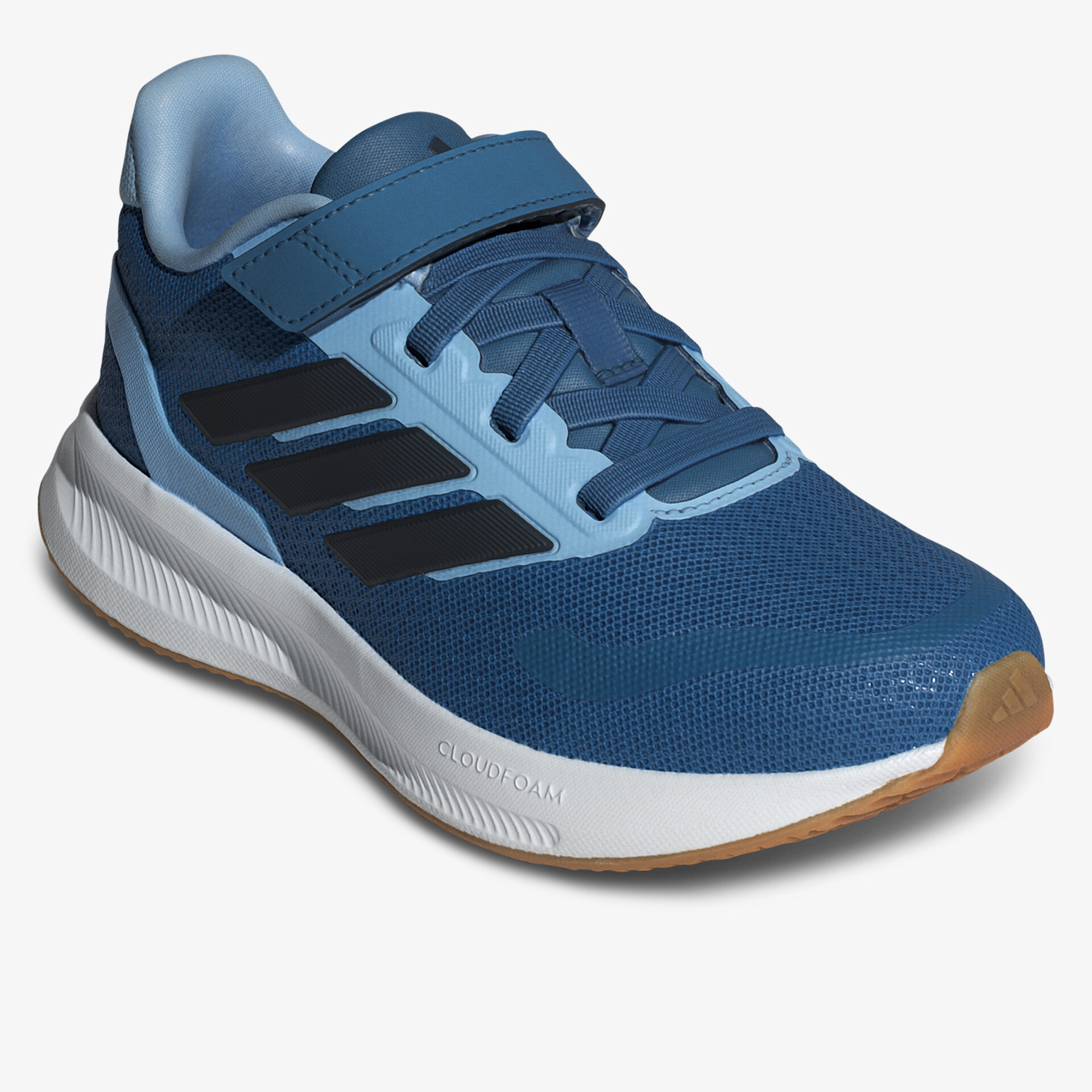 Sportlicher blauer Schuh mit strapazierfähiger Sohle und praktischem Klettverschluss