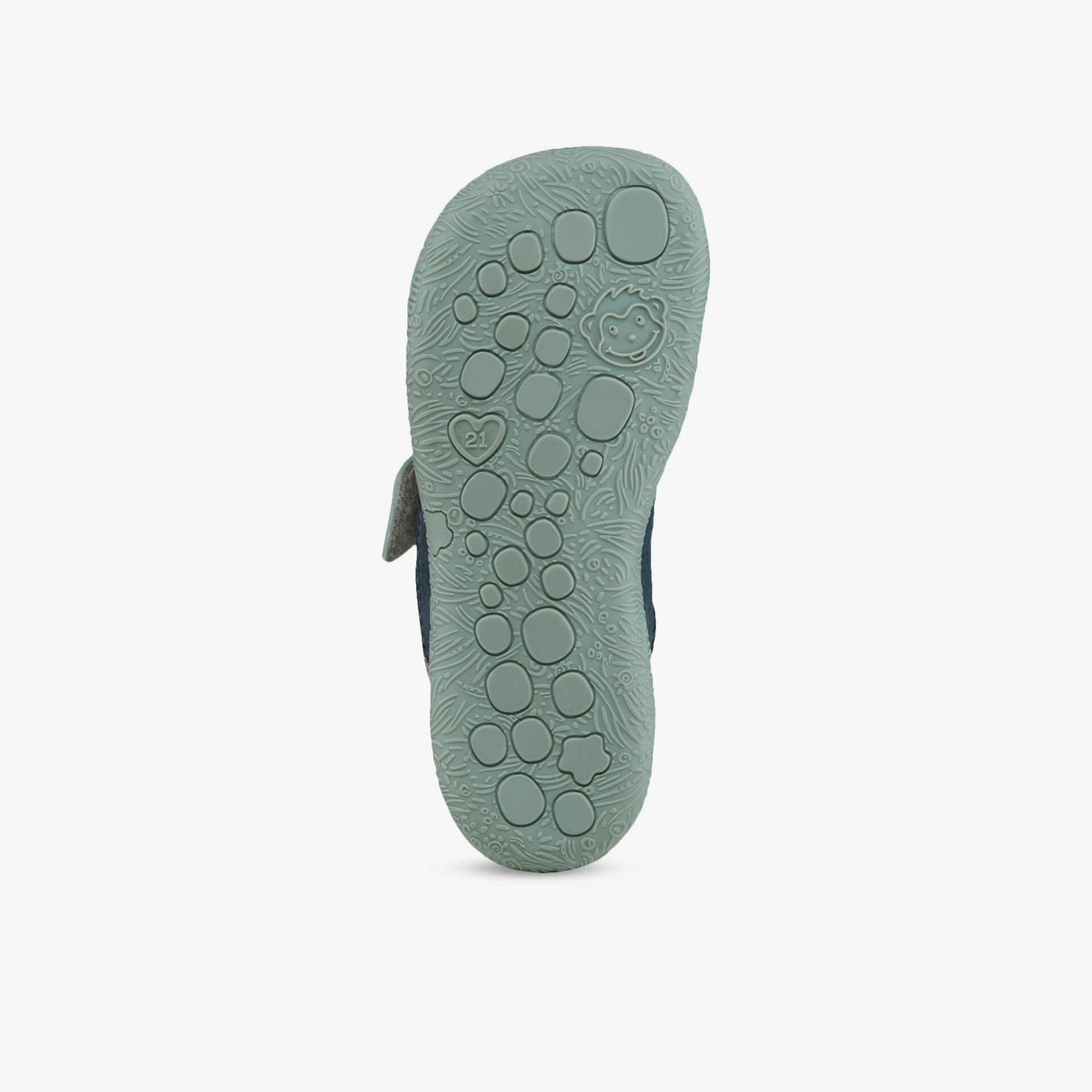 Detailansicht einer grünfarbenen Schuhsohle mit flexiblen, rutschfesten und stoßdämpfenden Eigenschaften