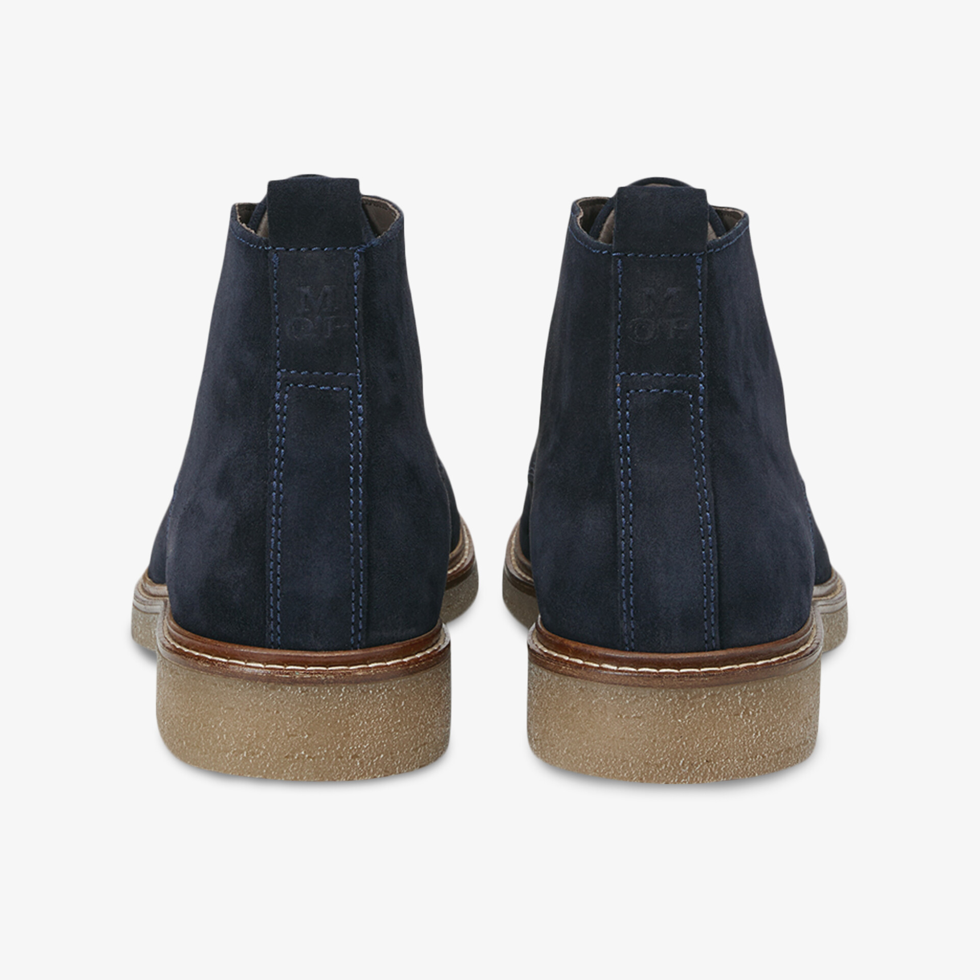 Moderne dunkelblaue Stiefelette aus Leder mit robuster heller Sohle und elegantem Design für vielseitige Anlässe.
