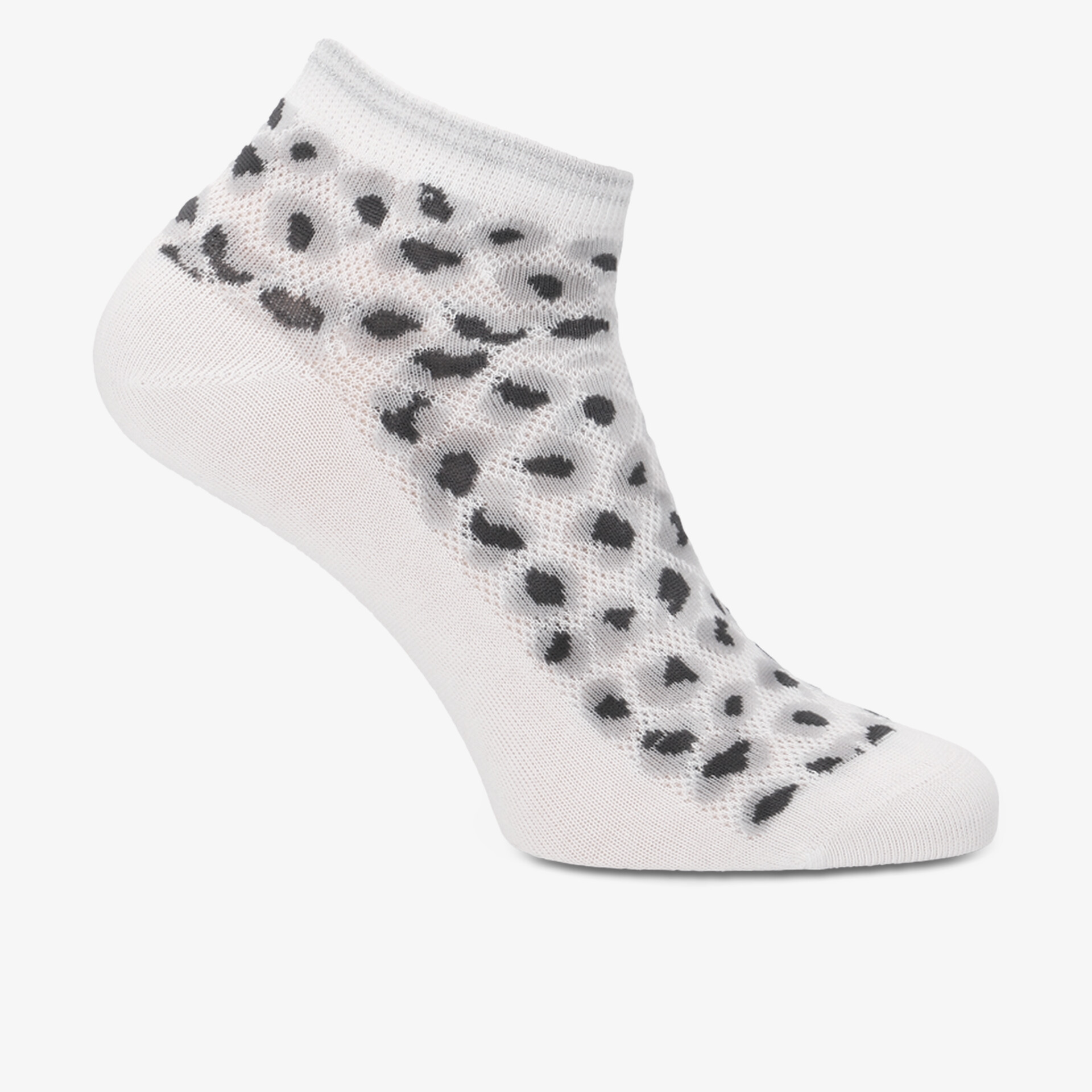 Elegante weiße Socken mit gepunktetem Muster für bequemen Tragekomfort.