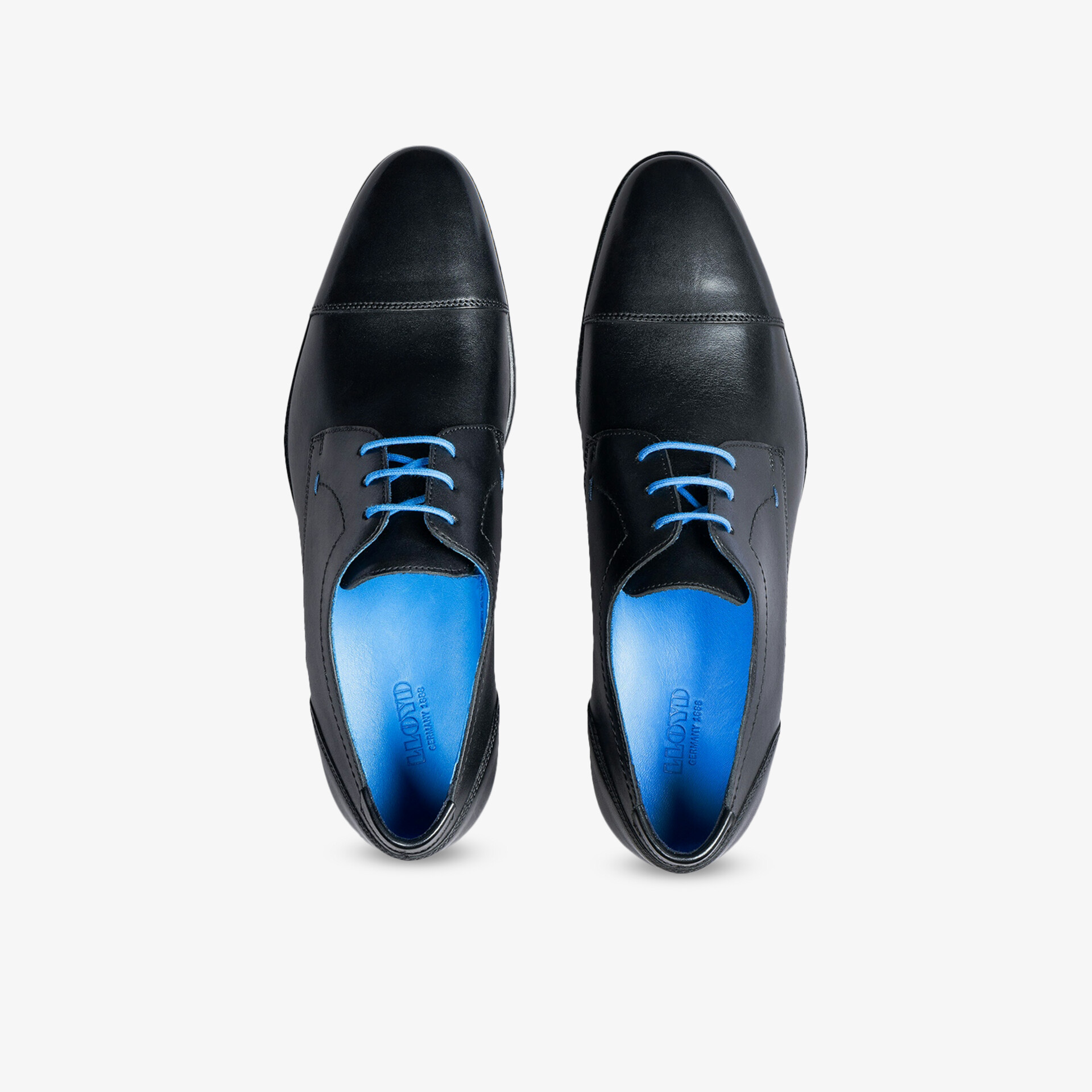 Elegante schwarze Lederschuhe mit blauen Schnürsenkeln, hochwertig, bequem und modisch, Draufsicht auf das Paar