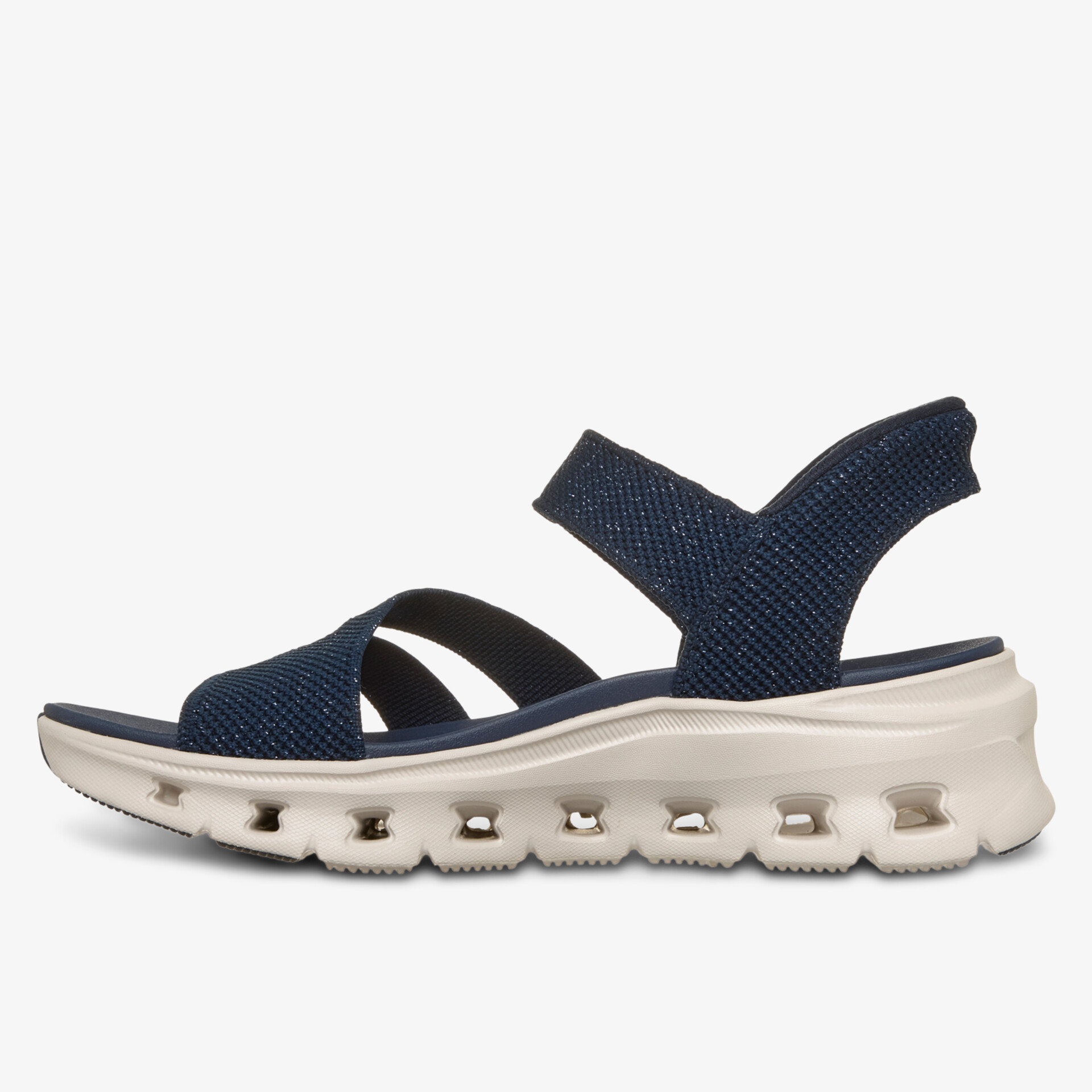 Seitenansicht einer bequemen, atmungsaktiven Sandale mit flexibler, leichter Sohle und elastischen Riemen