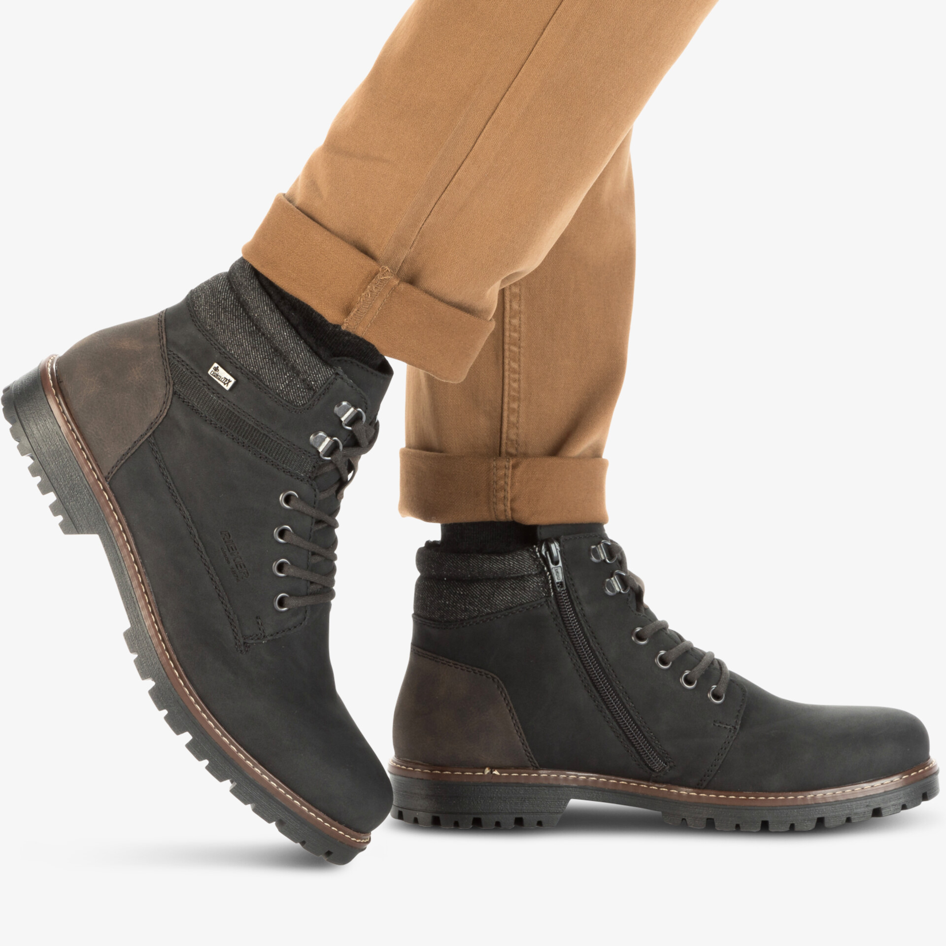 Robuste schwarze Stiefelette mit Profilsohle, Schnürung vorne, angenehmer Tragekomfort und modernem Design