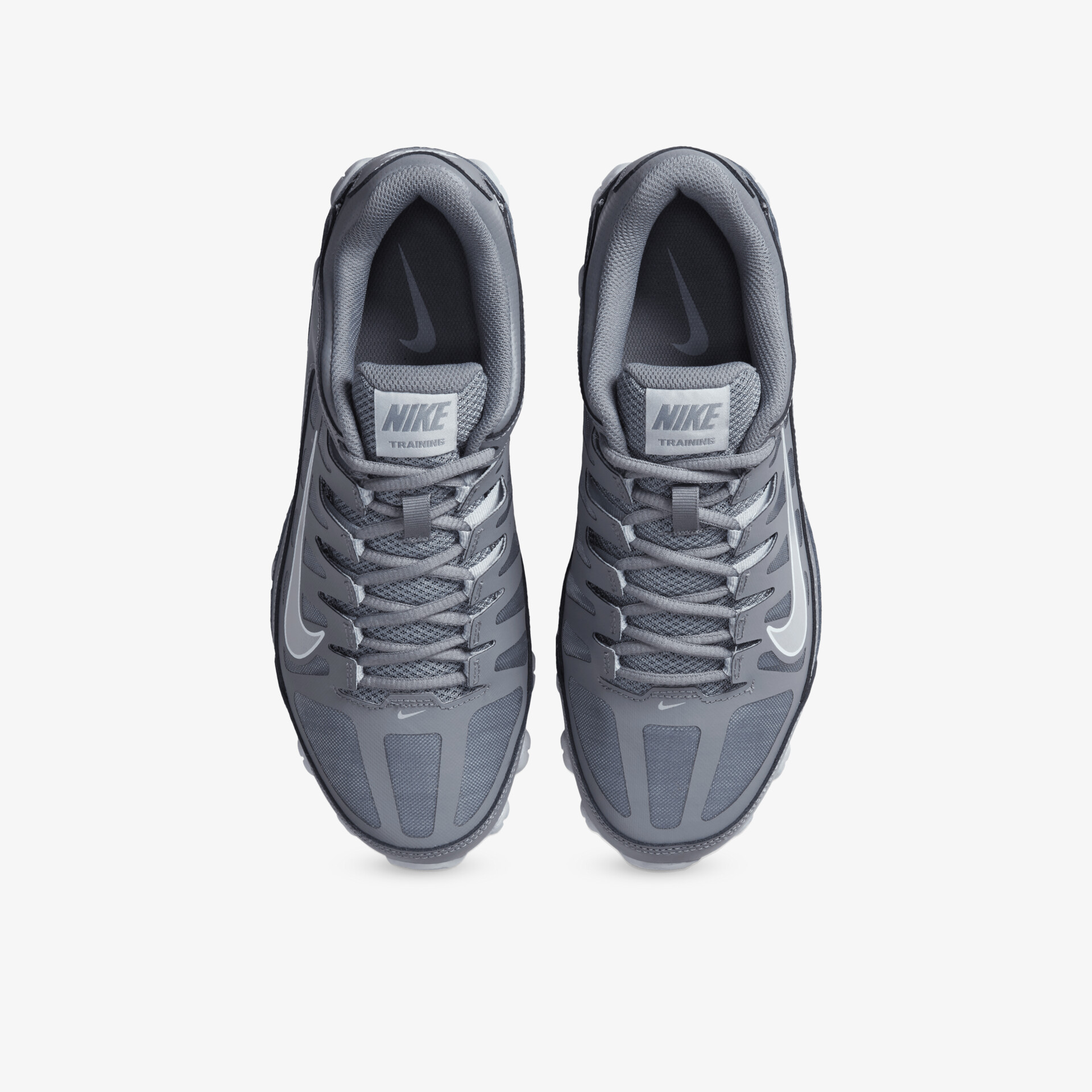 Graue Sportschuhe mit atmungsaktivem Material und gepolsterter Innensohle in klarer Draufsicht