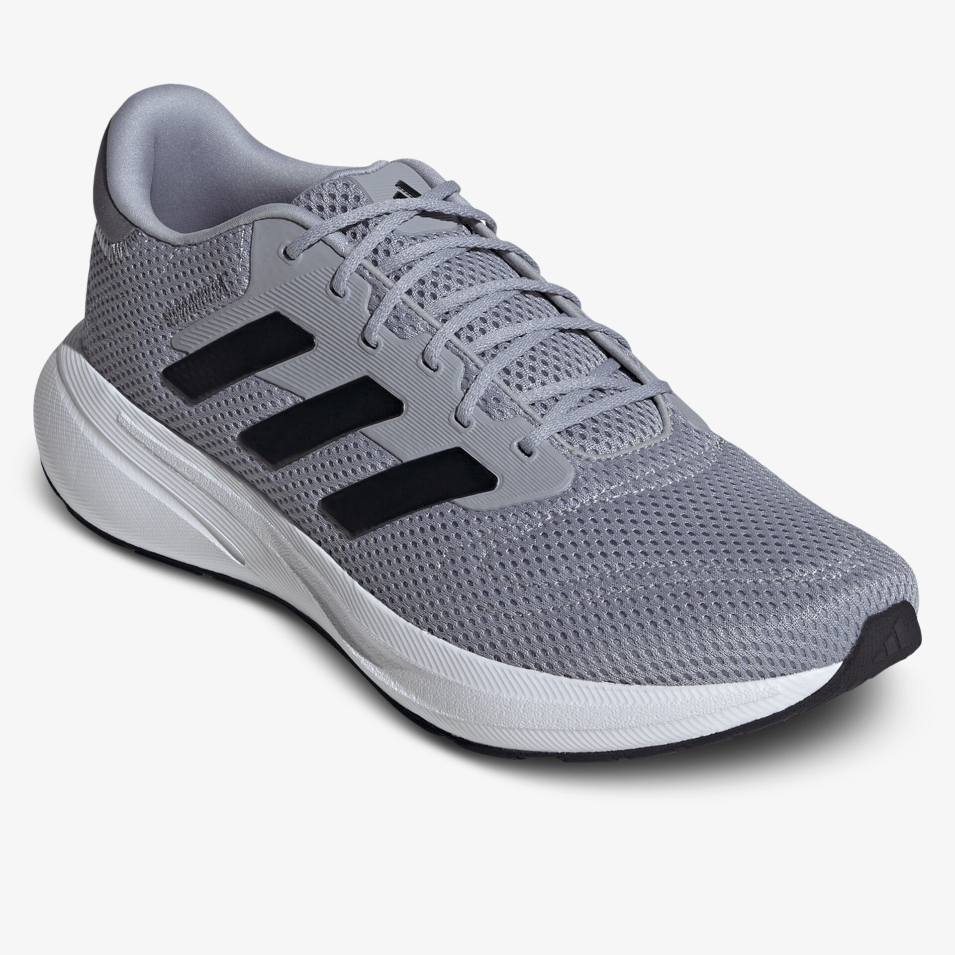 leichter grauer sportschuh mit atmungsaktivem obermaterial und rutschfester sohle für komfortable bewegung