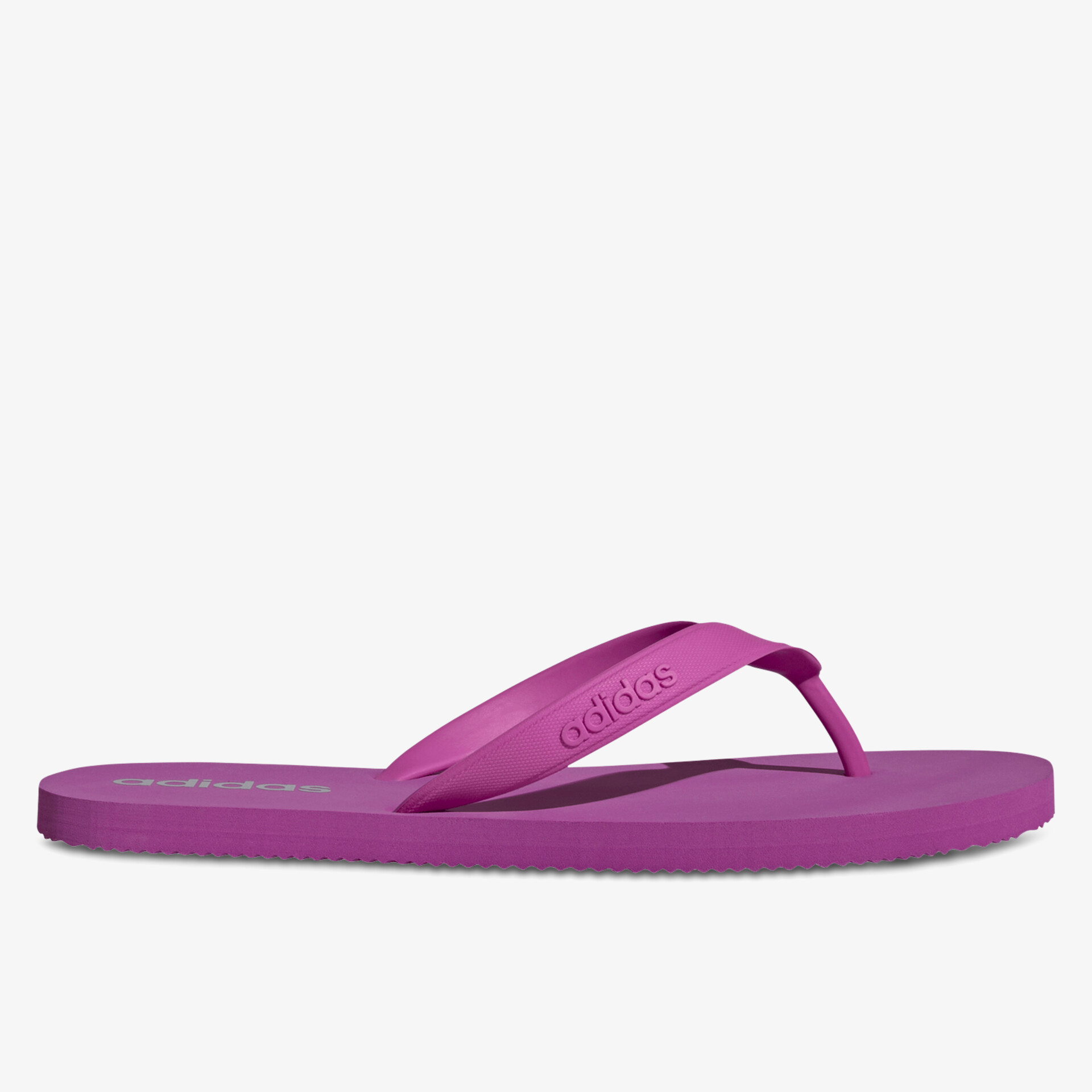 Seitliche Ansicht leichter und bequemer Flip Flop in kräftigem Pink mit flexibler, rutschfester Sohle