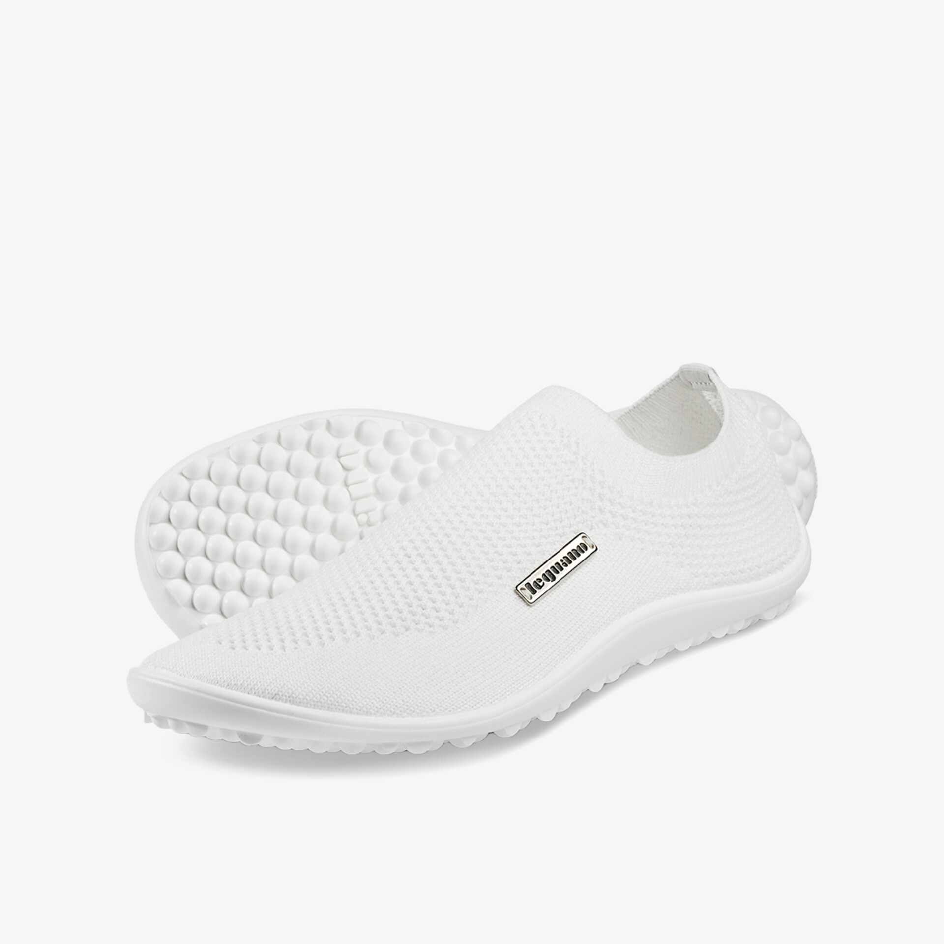 Eleganter, leichter Sneaker aus atmungsaktivem Material mit rutschfester Sohle für maximalen Komfort.