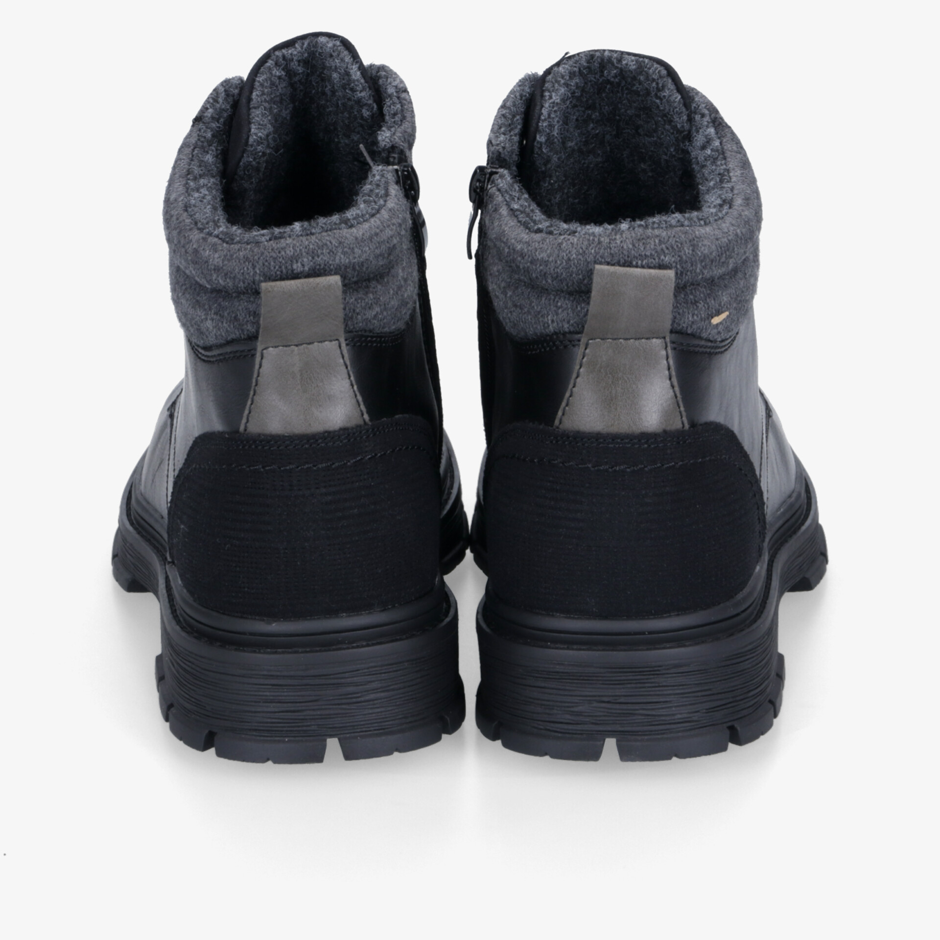 Wasserdichte und gefütterte Boots mit rutschfester Sohle für optimalen Komfort und Stabilität.