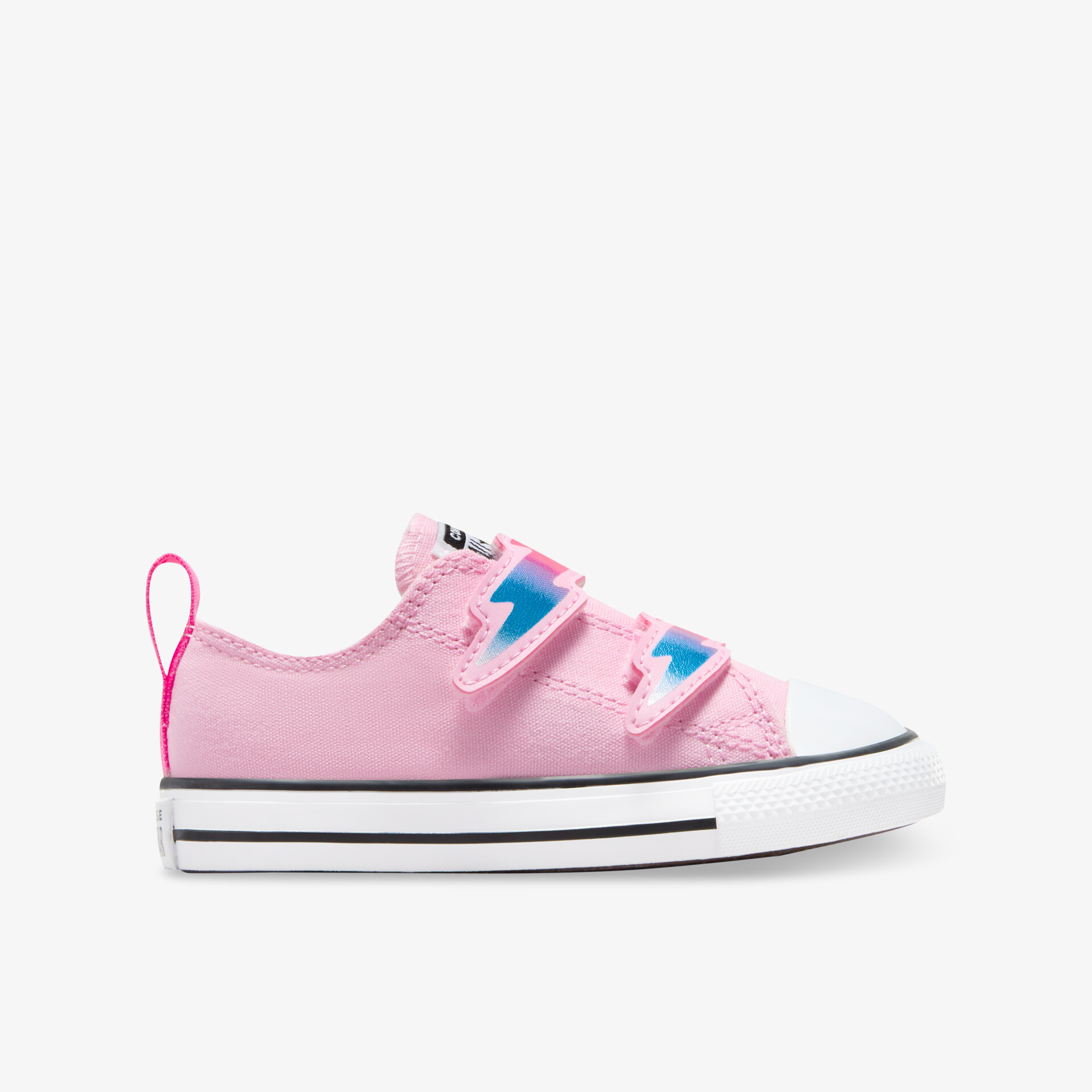 Leichter rosa Sneaker mit zwei Klettverschlüssen und weißer runder Gummisohle in klarer Seitenansicht